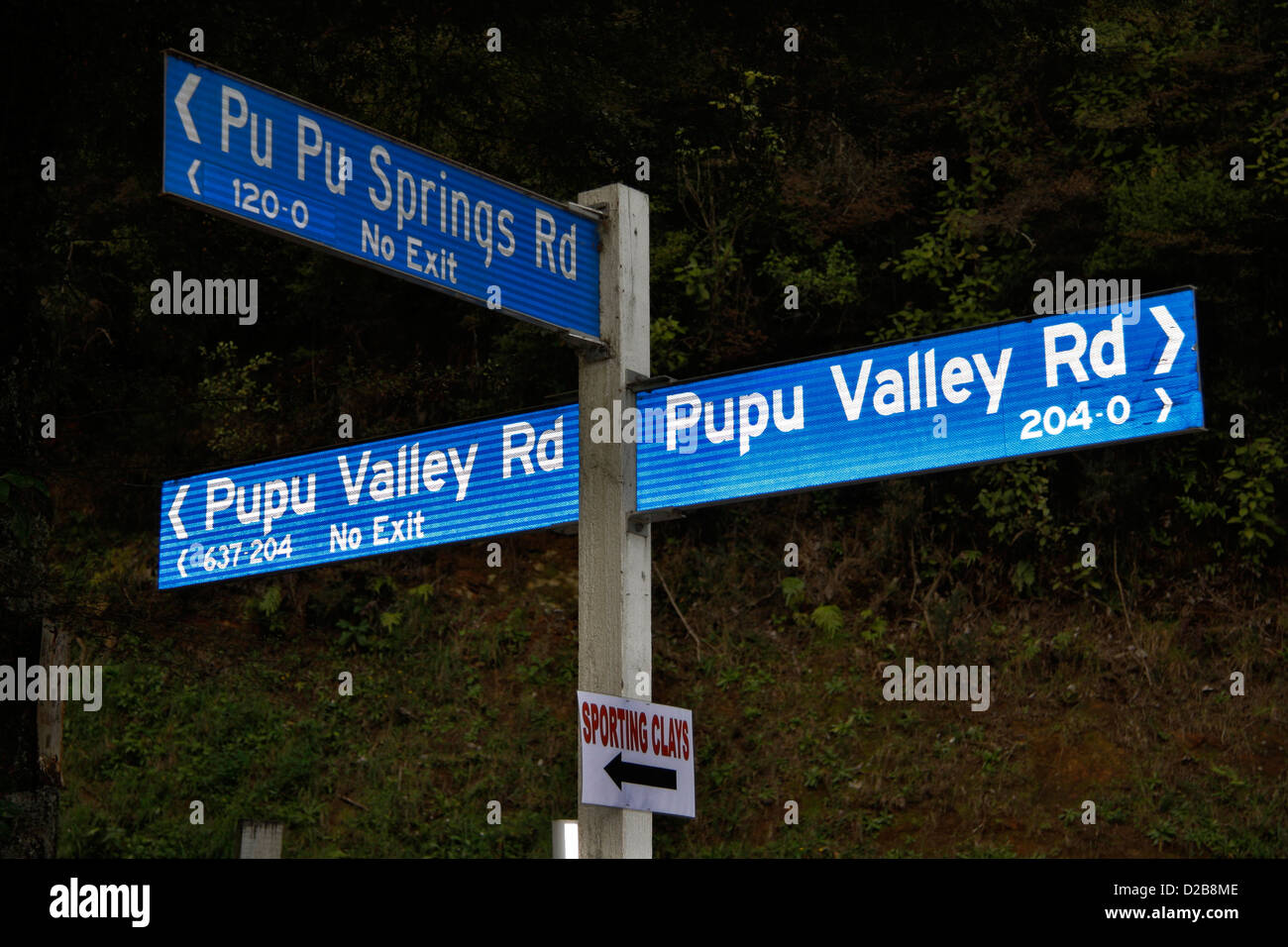 Three road signs in the valley where Te Waikoropupu Springs Scenic Reserve is located. Stock Photo