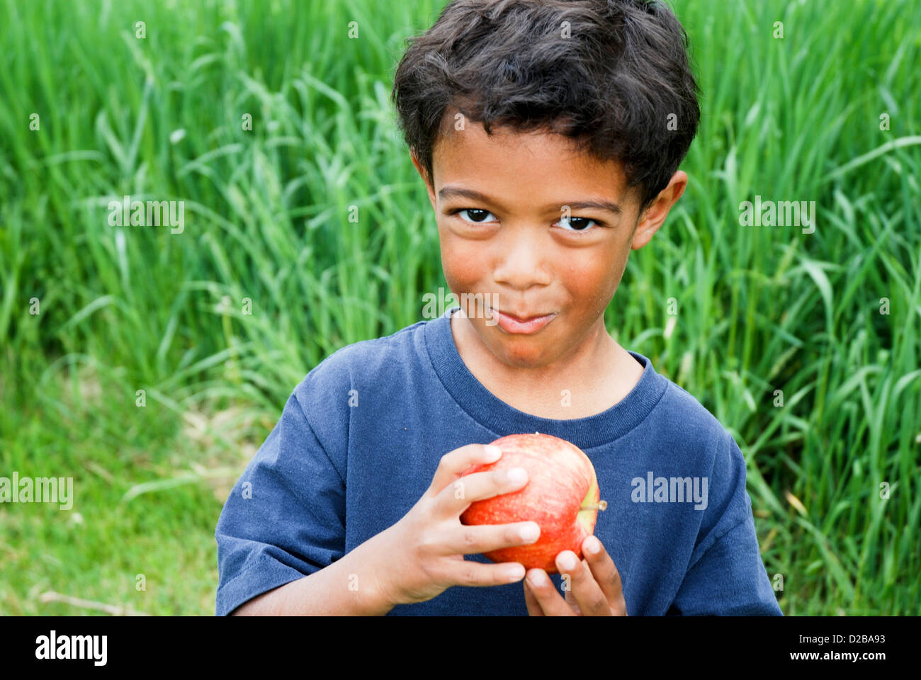 Boy Eating Apple Stock Photo Alamy