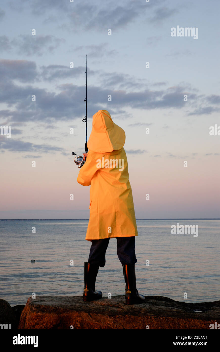 Boy With Fishing Gear In Yellow Slicker Martha'S Vineyard Stock Photo -  Alamy