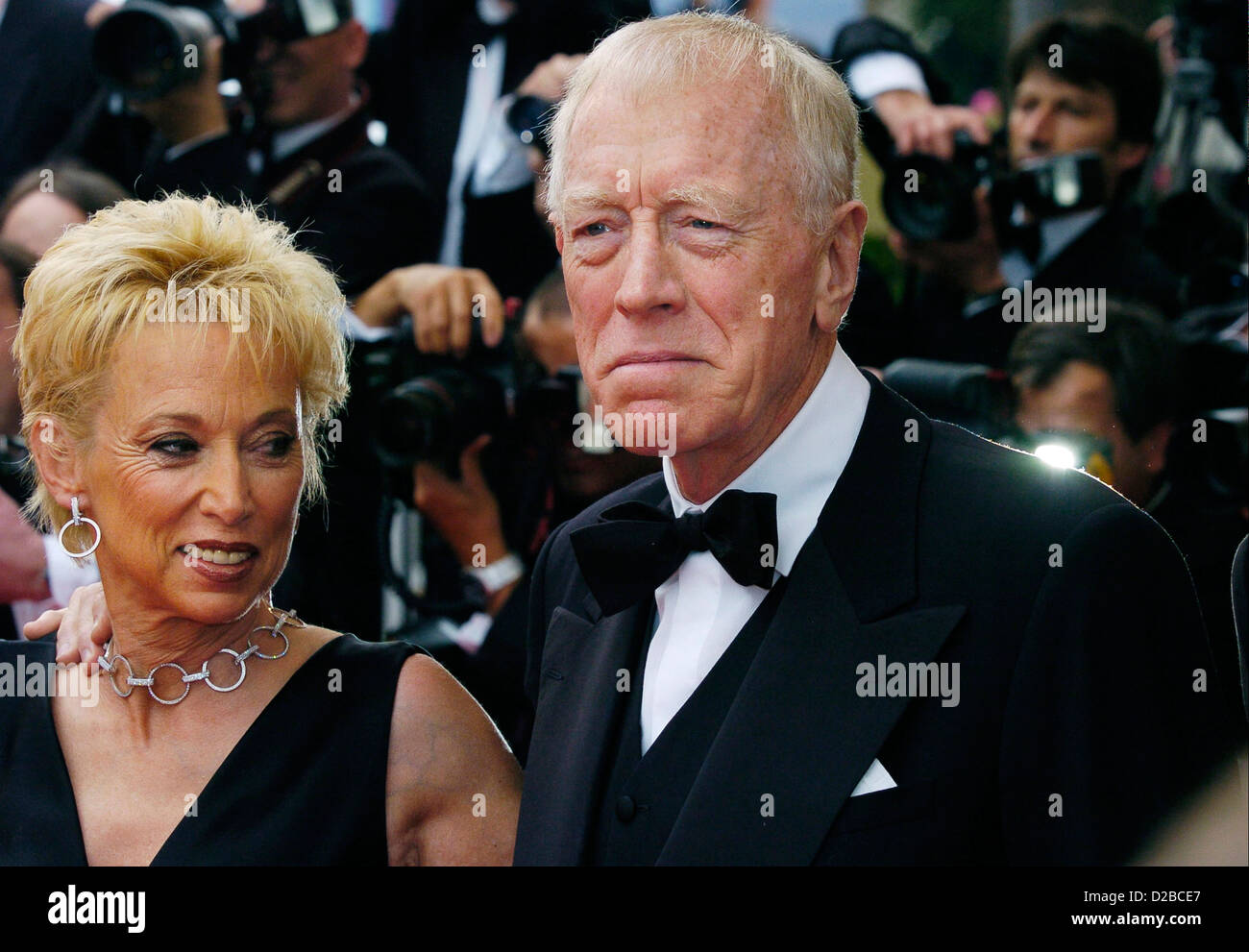 Festival De Cannes the Cannes Film Festival. Pictured on the red carpet for the opening night is Max von Sydow and wife. Stock Photo