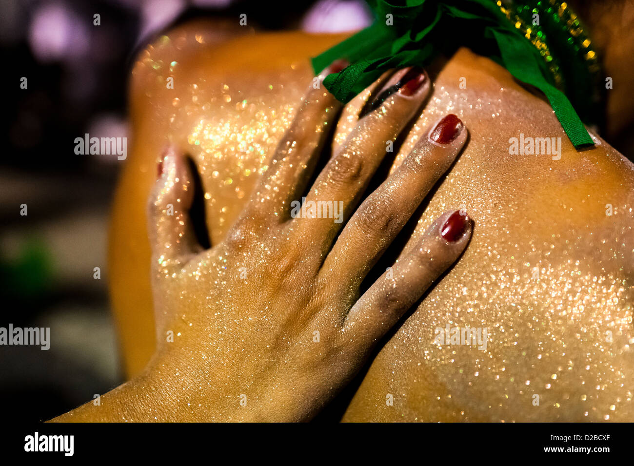 Samba school dancers prepare their makeups before entering the Carnival parade at the Sambadrome in Rio de Janeiro, Brazil. Stock Photo