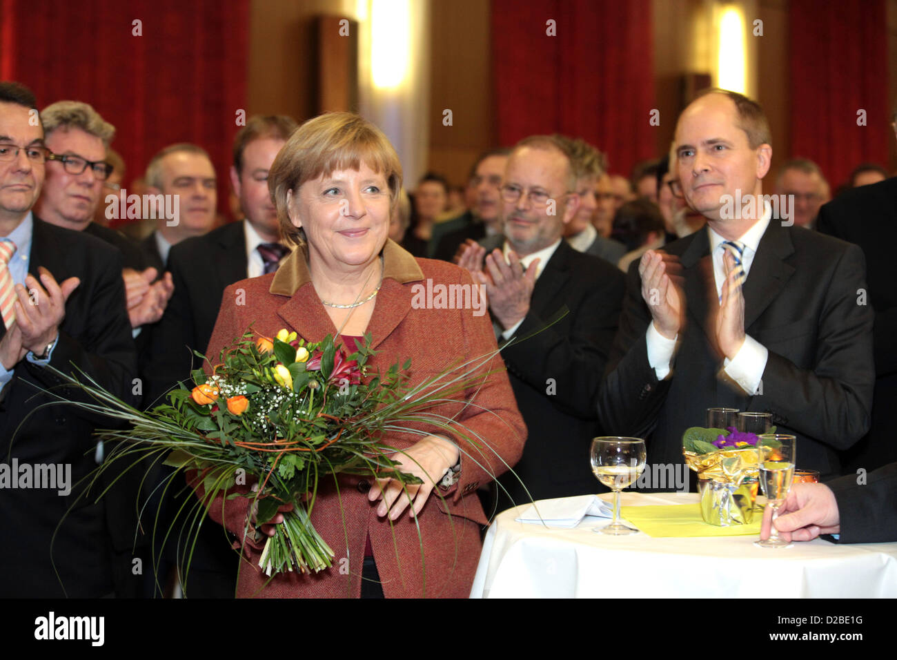 Angela Merkel (C), German Chancellor and chairwoman of the German conservative Christian Democratic Union, CDU, party,  delivers a speech during the New Year's reception of the electoral district West Pomerania and Ruegen in Trinwillershagen, Germany, 18 January 2013. Merkel applies for direct candidate of her home electoral district for the general elections in Germany later this year 2013 at a CDU meeting on 19 January. Photo: Ove Arscholl Stock Photo