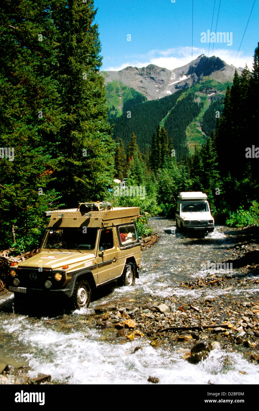 Colorado. Rockies. Mercedes-Benz Land Rover Driving Through Streams, In Rugged Terrain Stock Photo
