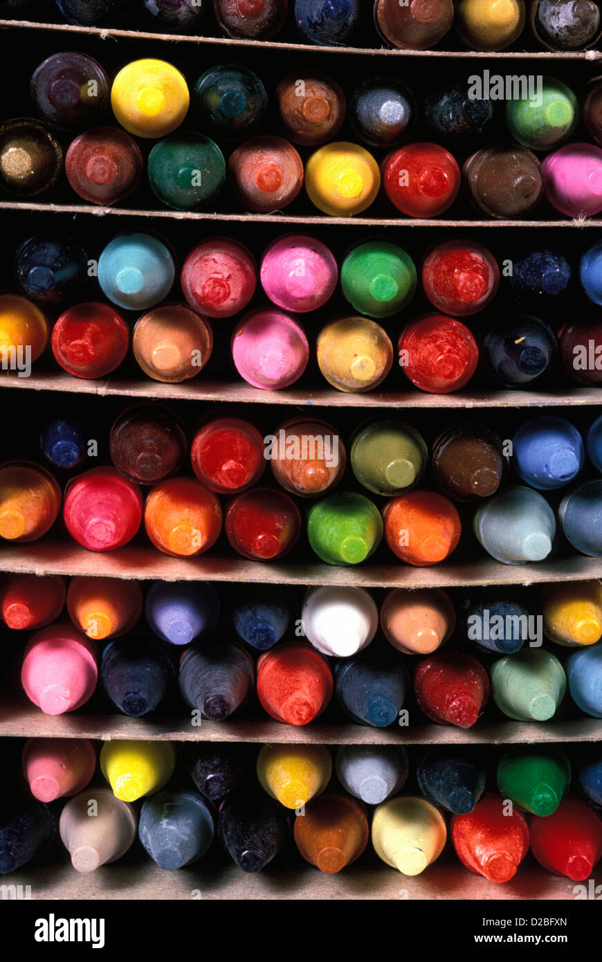 Many Rows Of MultiColored Crayons Lined Up In A Box, CloseUp Stock