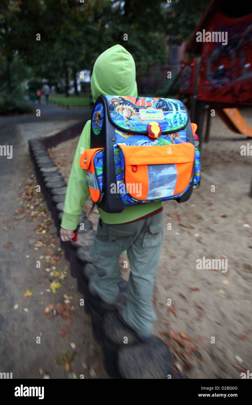 Berlin, Germany, a schoolgirl with satchel goes home Stock Photo