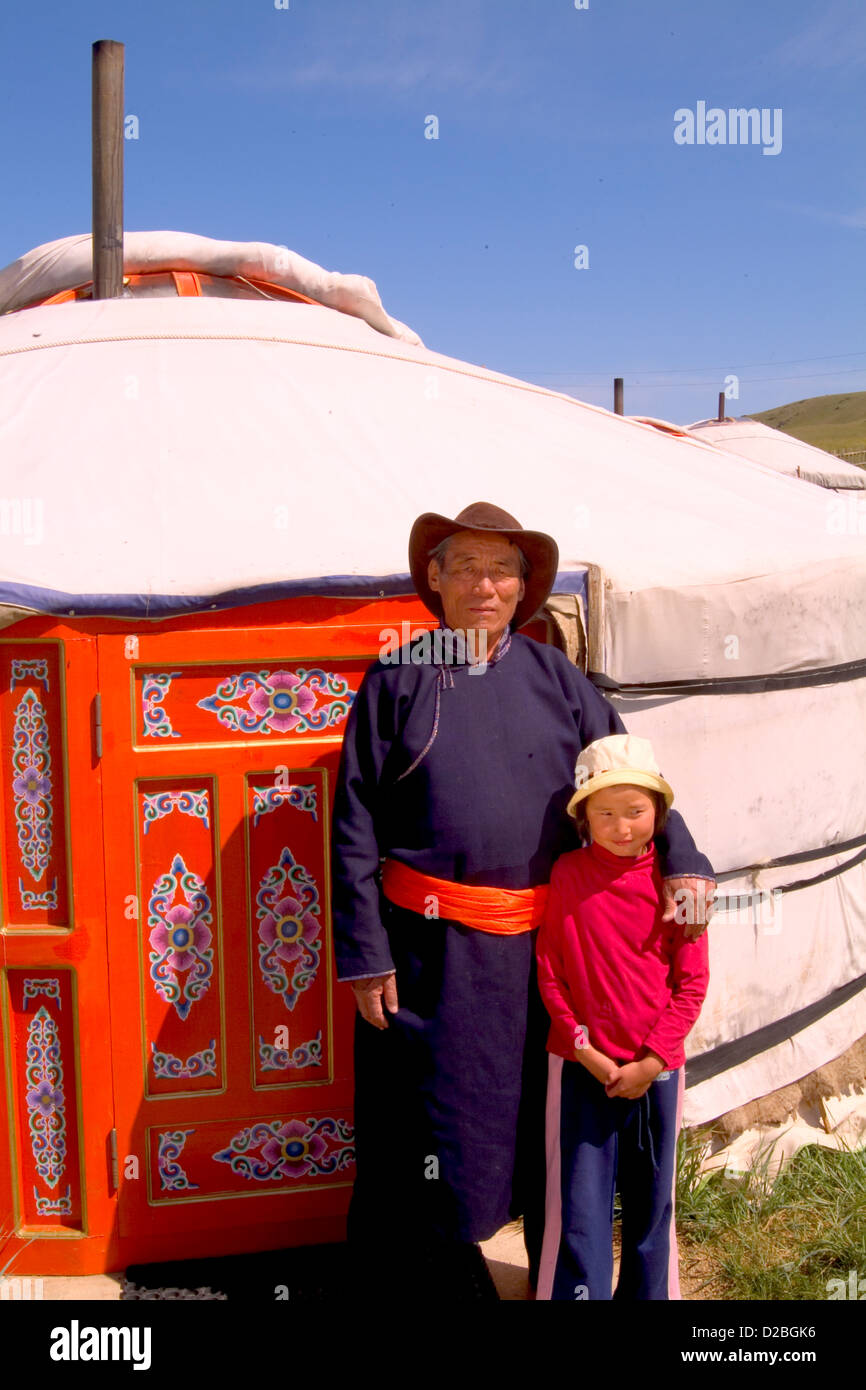 Mongolia, Nomadic Villager And Granddaughter Standing Next To A Ger ...