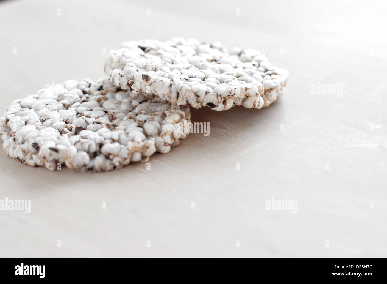 Organic Rice Cakes on wooden table Stock Photo