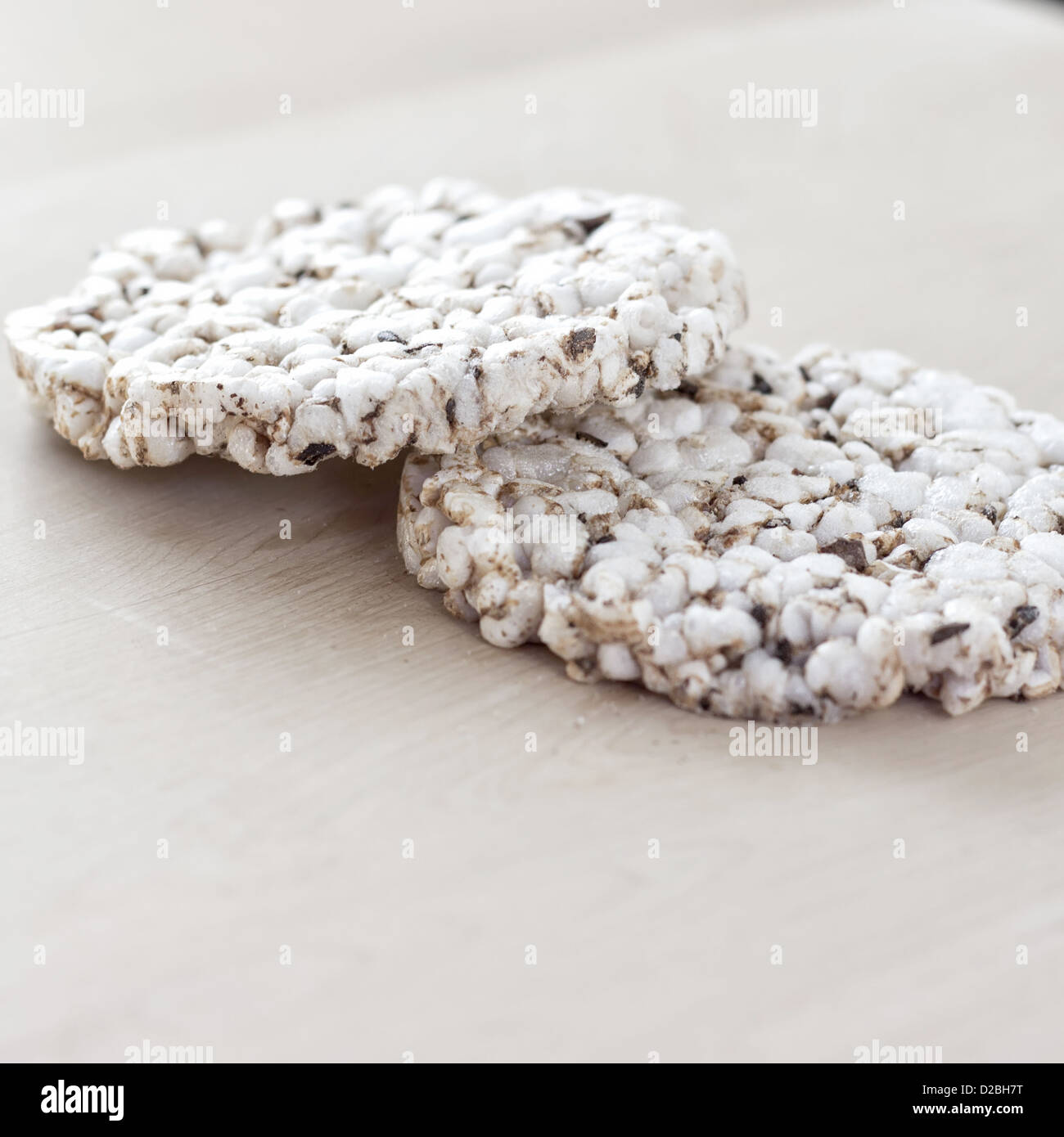 Organic Rice Cakes on wooden table Stock Photo