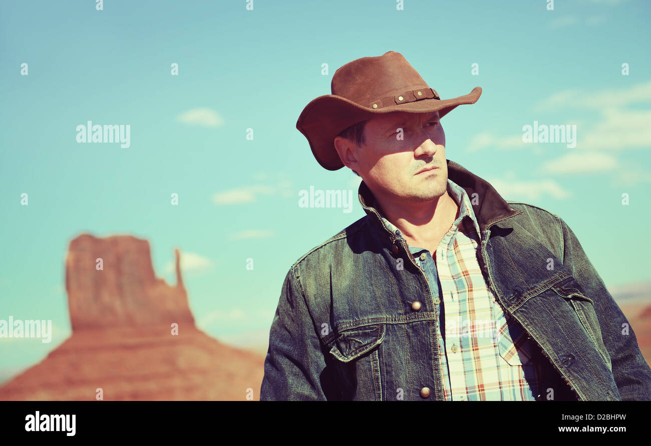 attractive cow boy in famous Monument valley National tribal park, USA Stock Photo