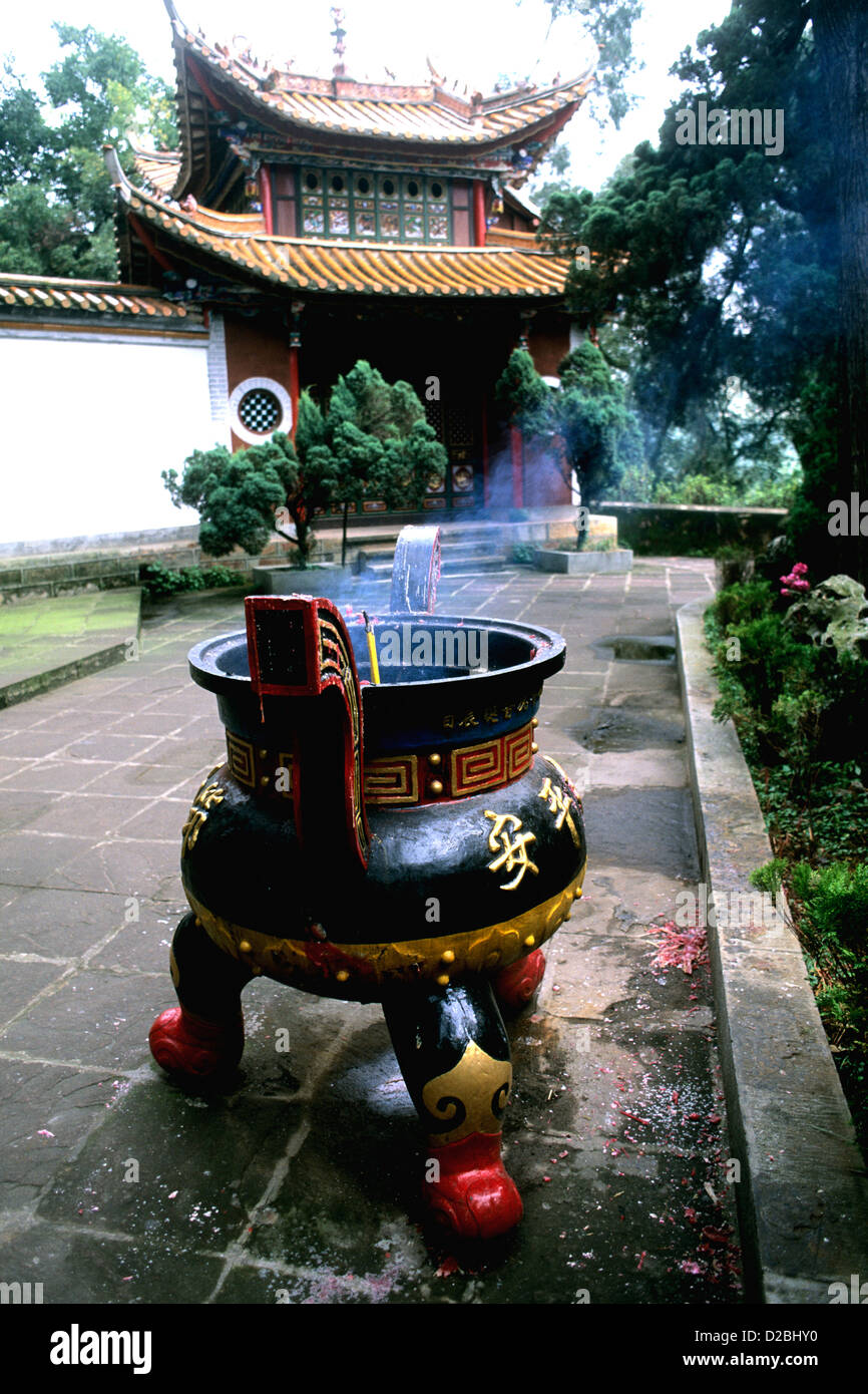 China, Kumming, Bamboo Village. Incense Burning Stock Photo