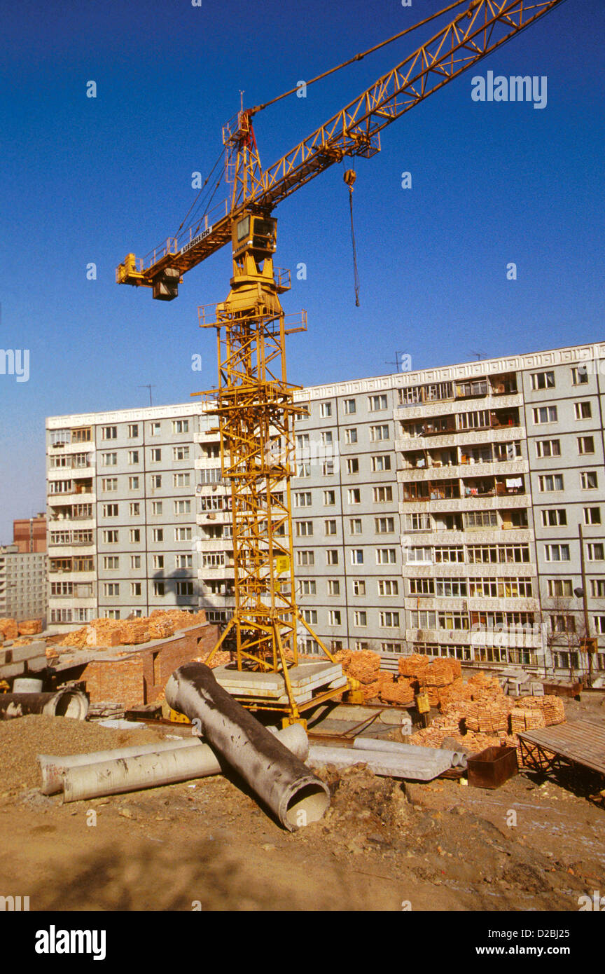 Large Crane At Construction Site For Housing Development Stock Photo