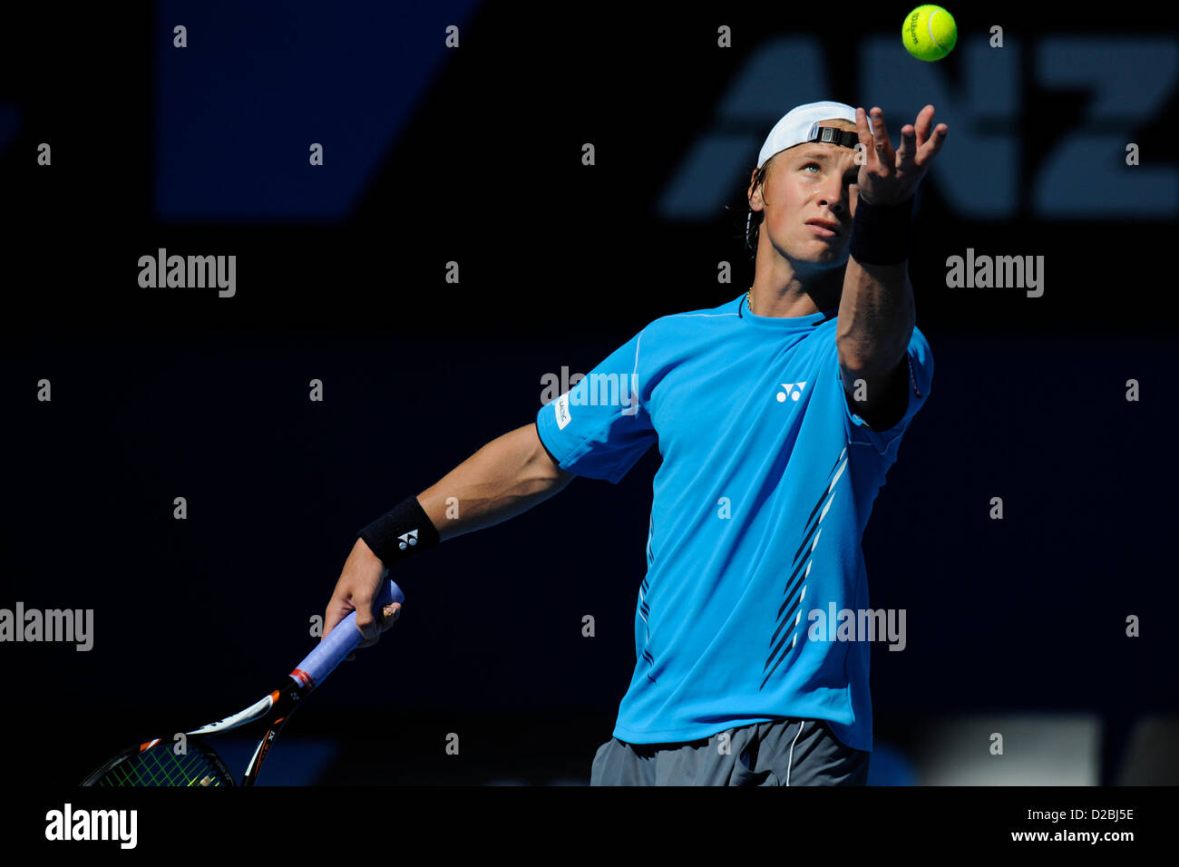 19th January 2013. Melbourne, Australia. Ricardas Berankis of Lithuania hits a return shot in his match on day six of the Australian Open from Melbourne Park. Stock Photo