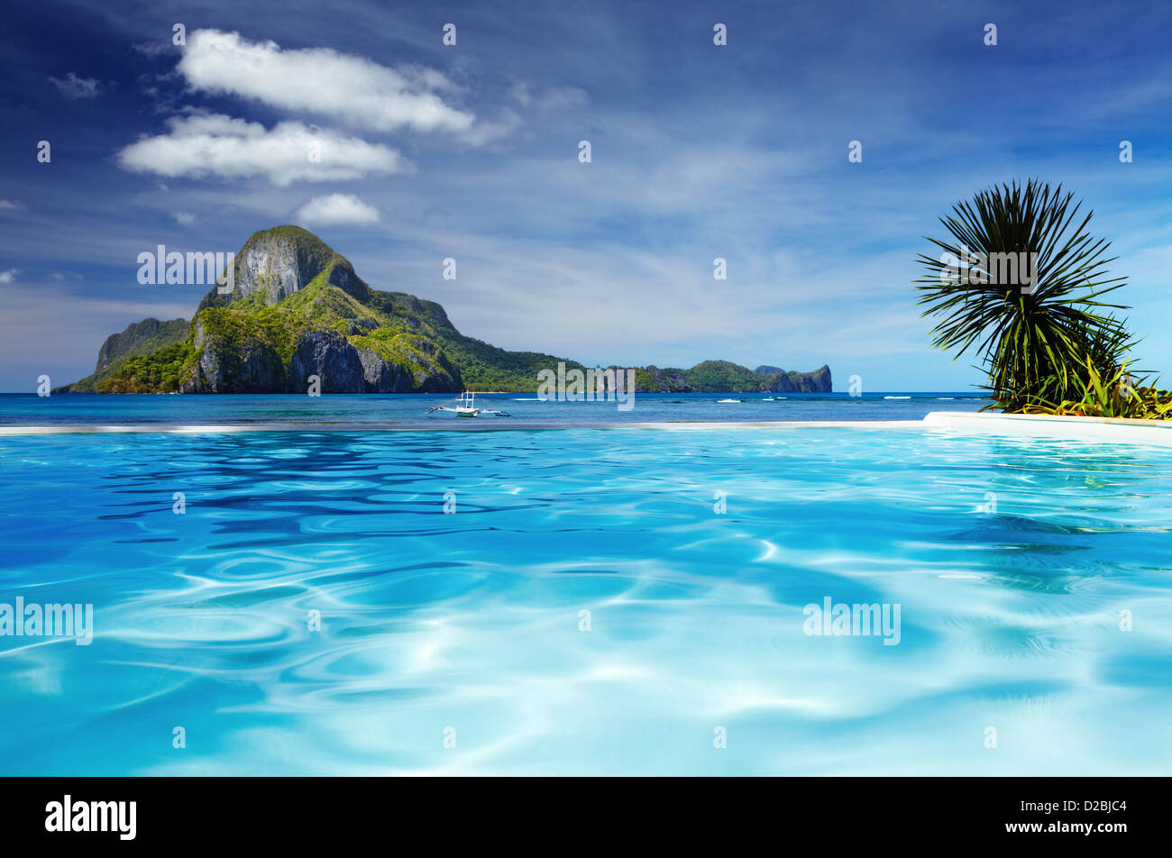 Landscape with swimming pool and Cadlao island on background, El Nido, Philippines Stock Photo