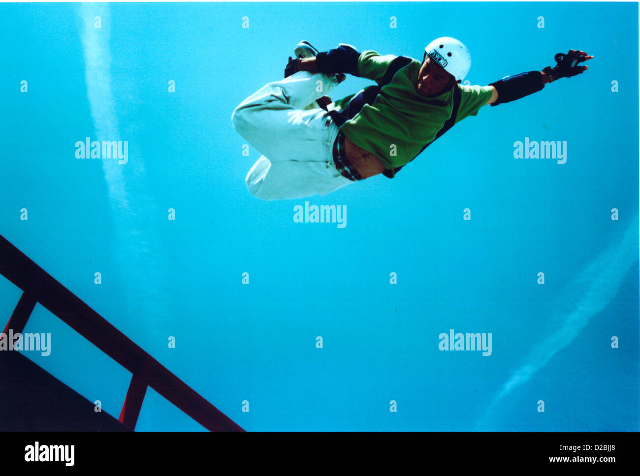 Male rollerblader doing aerial on vertical hi-res stock photography and ...