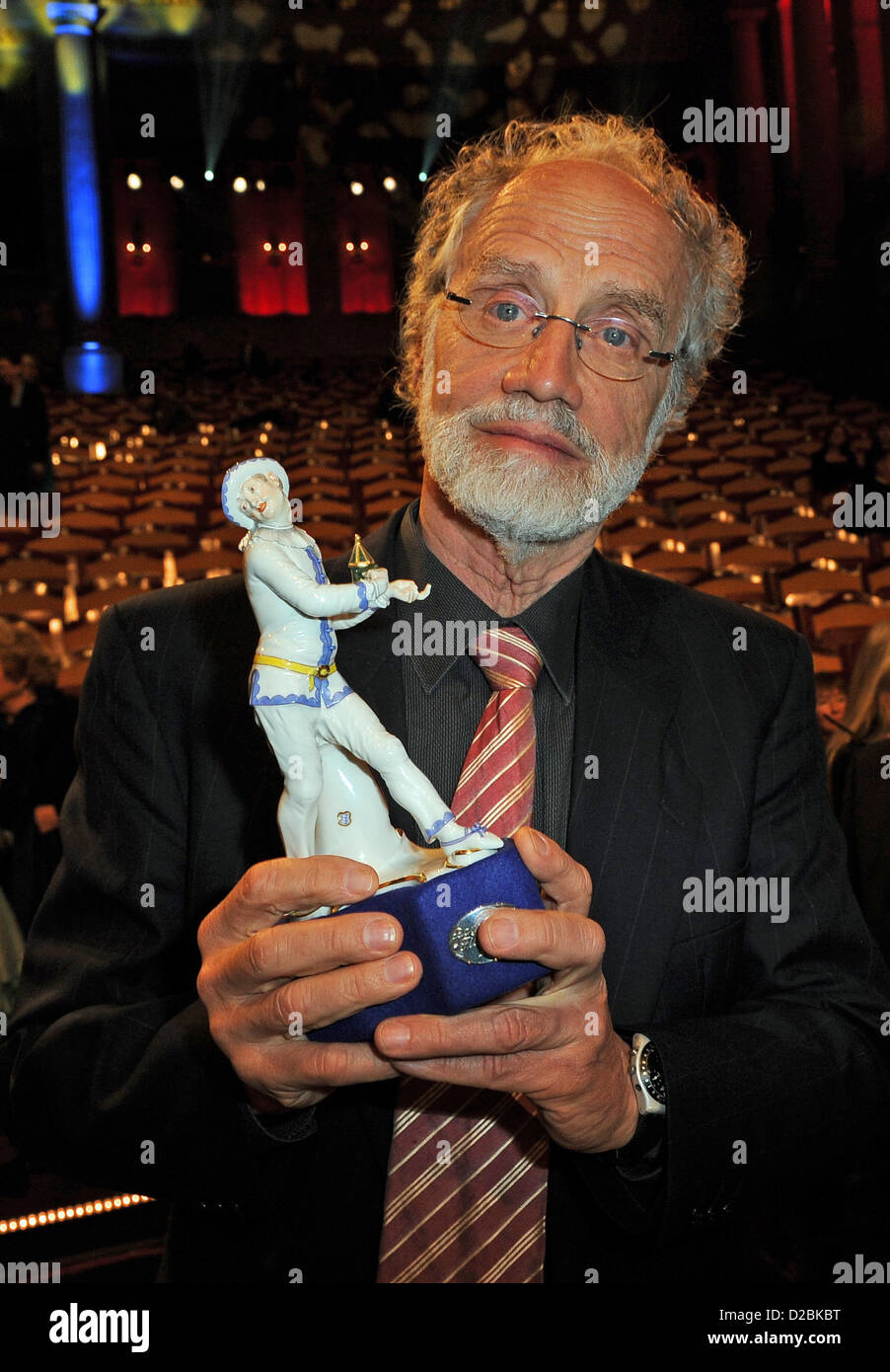 German film director Markus Imhoof poses with his award in his hands after the awarded ceremony of the Bavarian Film Awards 2012 in Munich, Germany, 18 January 2013. Bavarian Film Prize is one of the most sought after film awards in the German film industry. Photo: Ursula Dueren Stock Photo