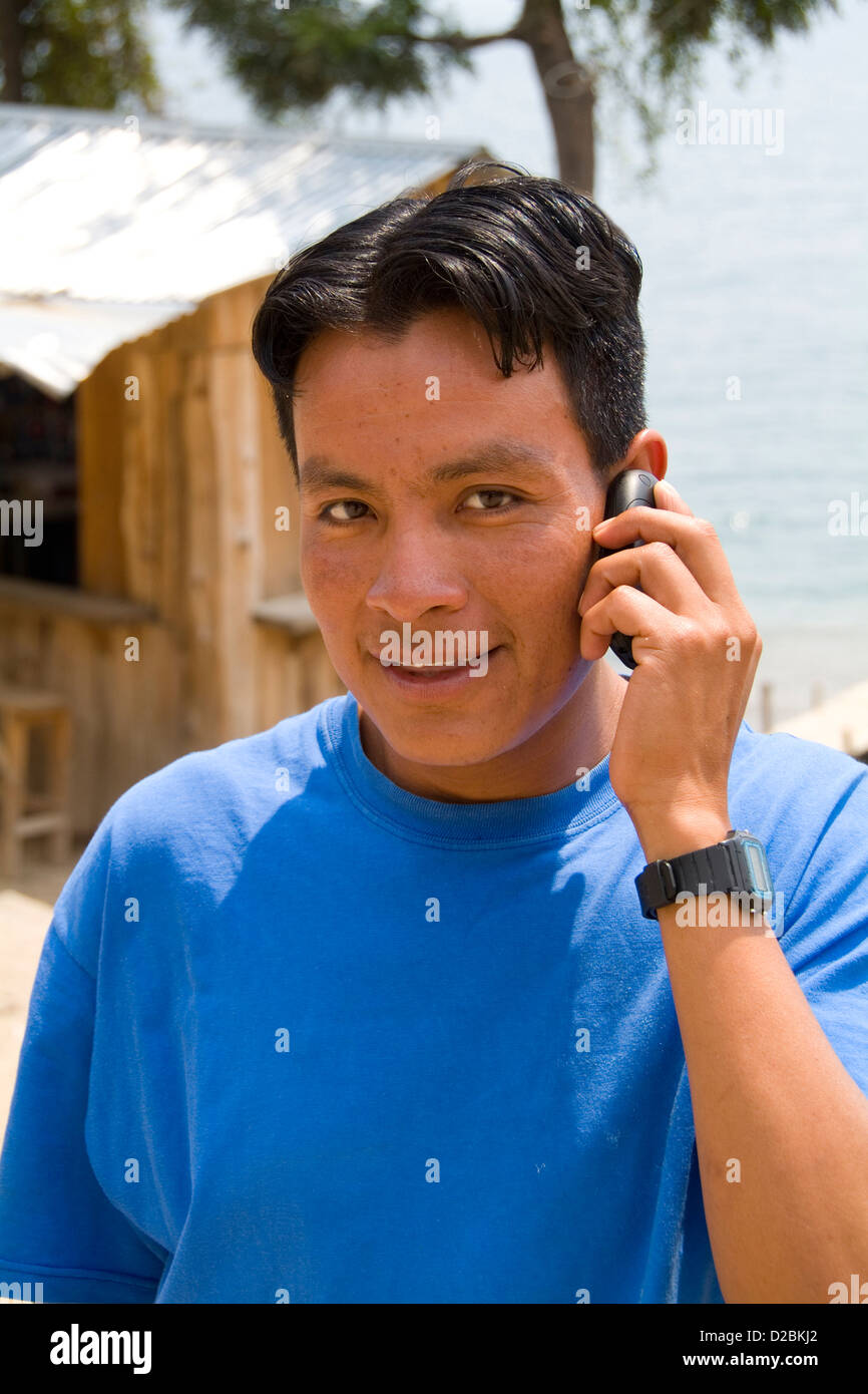 Guatemala, Man Using Cell Phone Stock Photo