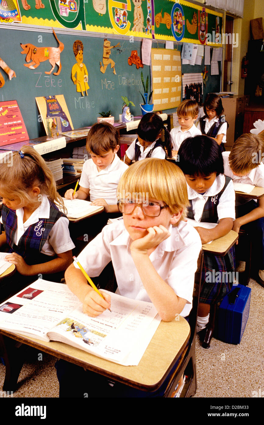 Elementary Students At Their Desks Stock Photo Alamy