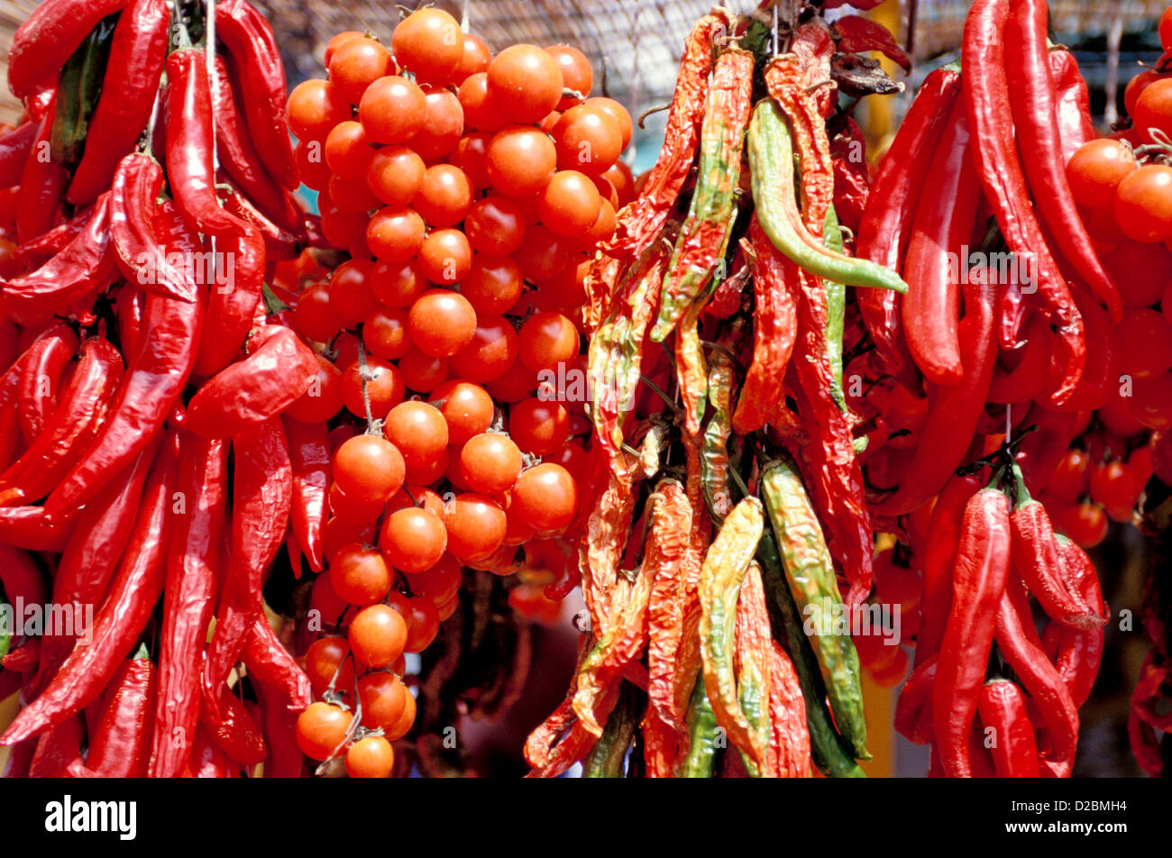 Italy, Campania, , Gulf Of Salerno , The Amalfi Coast. Close-Up Of Hanging Peppers And Cherry Tomatoes Near Positano. Stock Photo