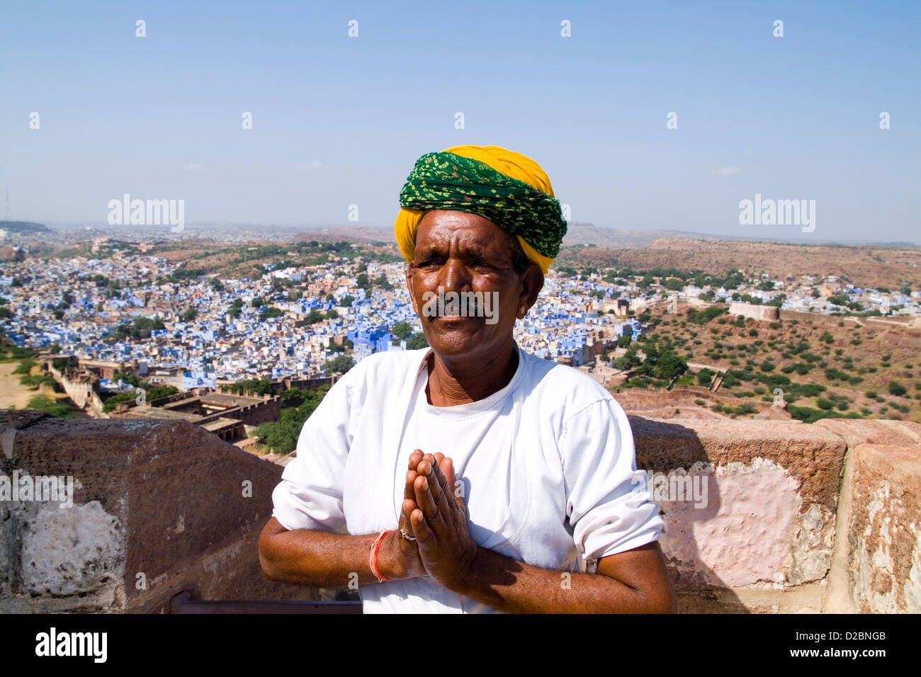 Hindu Man With Turban In Blue City Of Jodhpur At Fort Mehrangarh In Rajasthan India Stock Photo