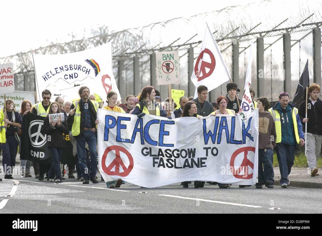 Peace protesters marching to the North Gate of Faslane ,protesting against the Iraq war,and weapons of mass destruction. Stock Photo