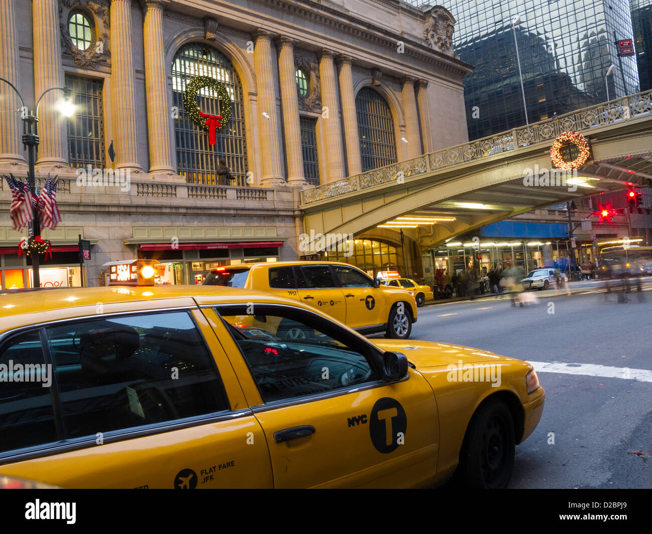 Speeding Cabs on 42nd St., Entrance Grand Central Terminal, during the Holidays NYC Stock Photo