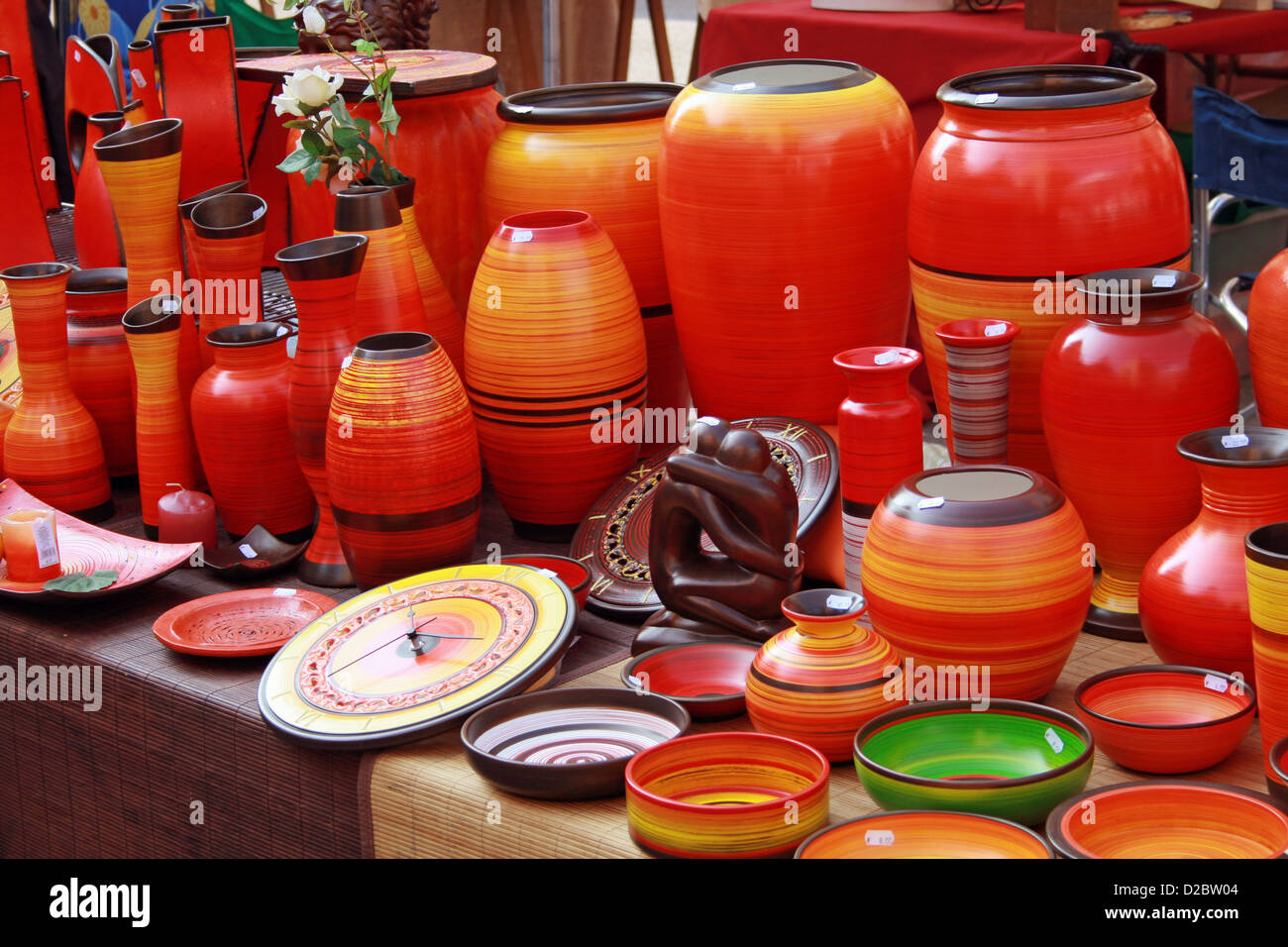 orange vases for sale at the local market Stock Photo Alamy