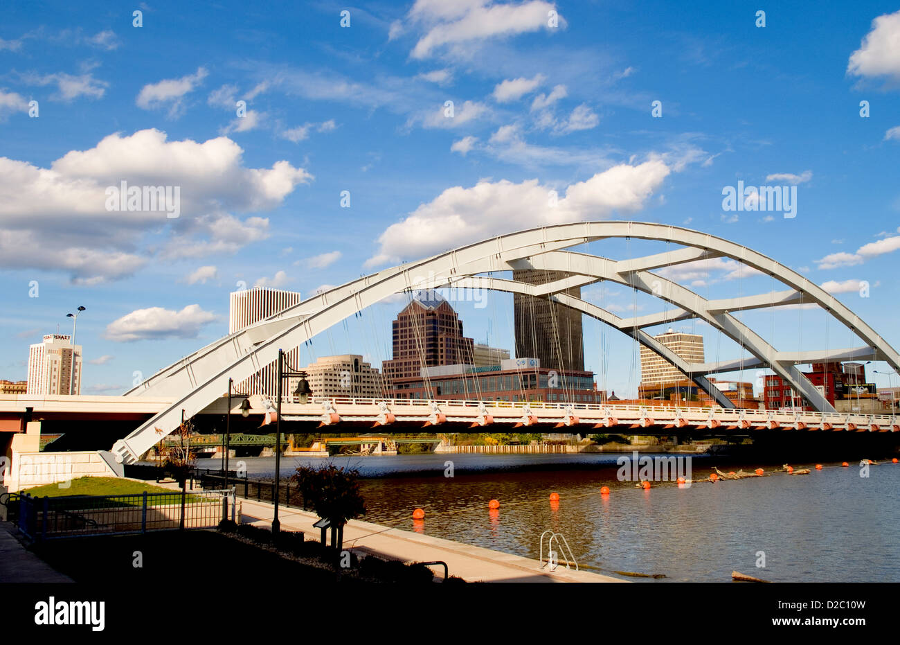Rochester New York Skyline With The Genesee River And The Susan B. Anthony And Fredrick Douglas Bridge Stock Photo