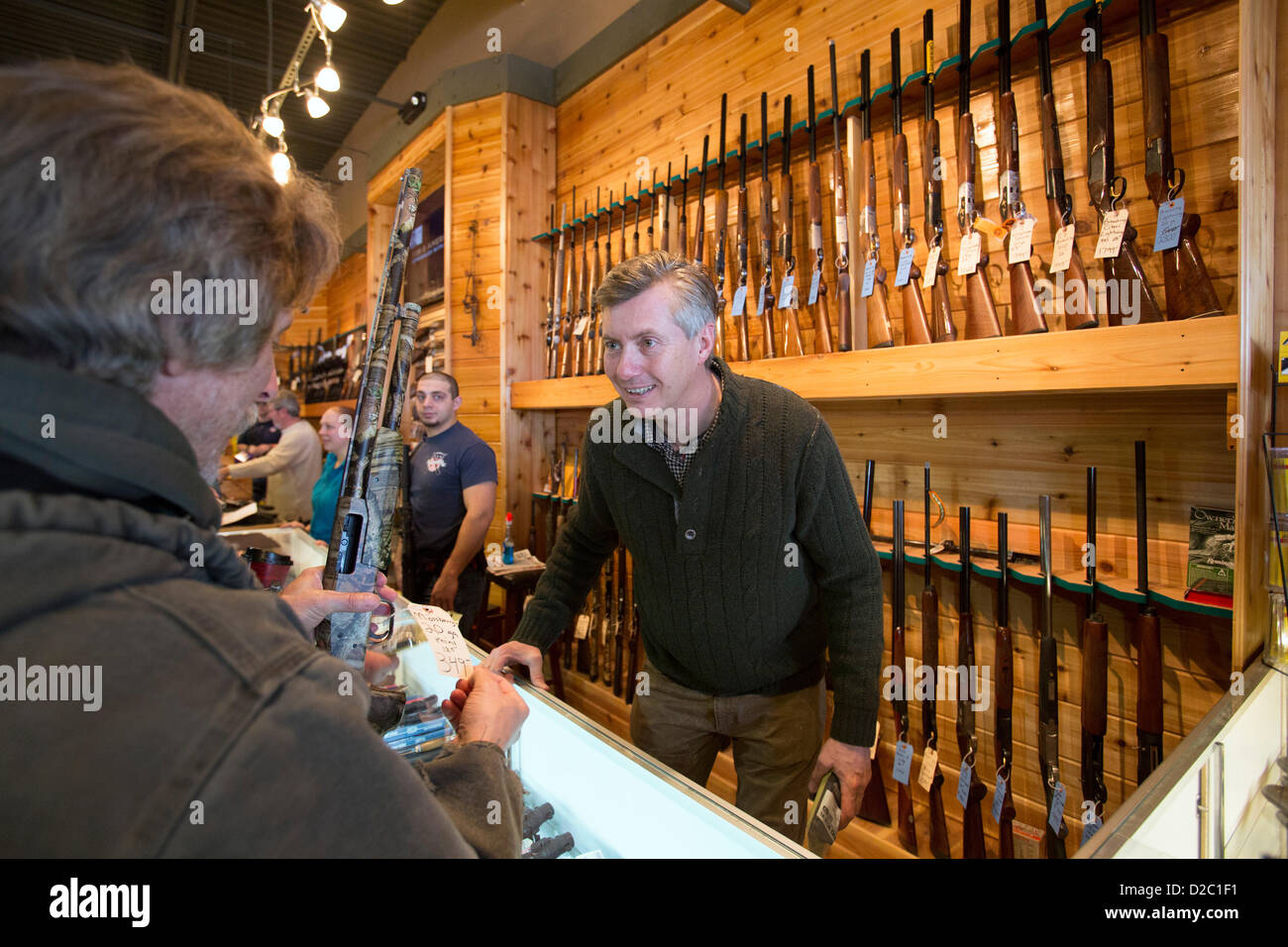 Milford, Michigan - Customers crowded the Huron Valley Guns store on Gun Appreciation Day. Pro-gun groups gathered at gun stores across the nation to buy weapons and to oppose proposed limits on gun ownership. Assault weapons at this store were in such short supply that customers had to enter a lottery for the right to buy one. Stock Photo