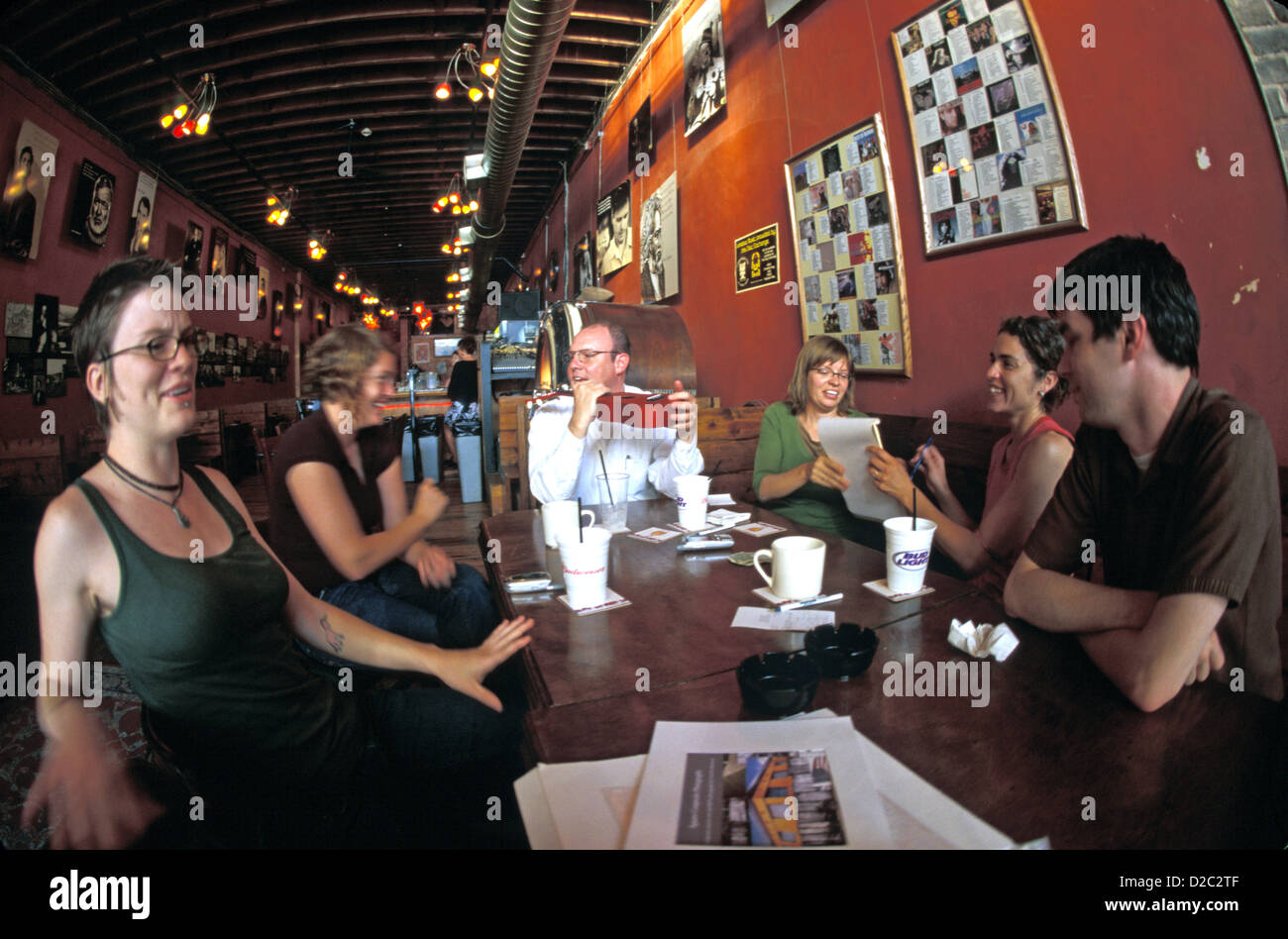 Group Of People In Restaurant Stock Photo