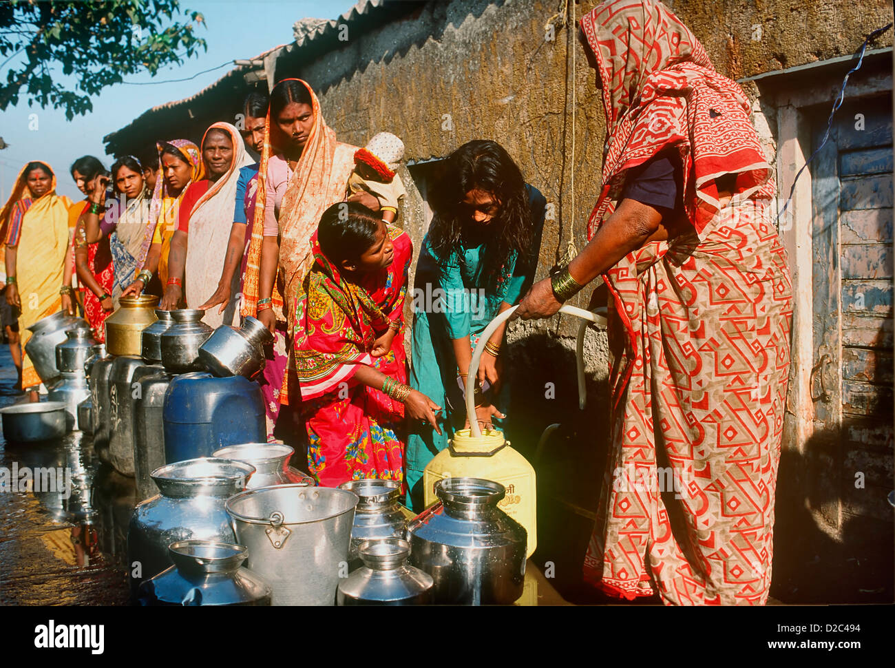People Queuing For Water