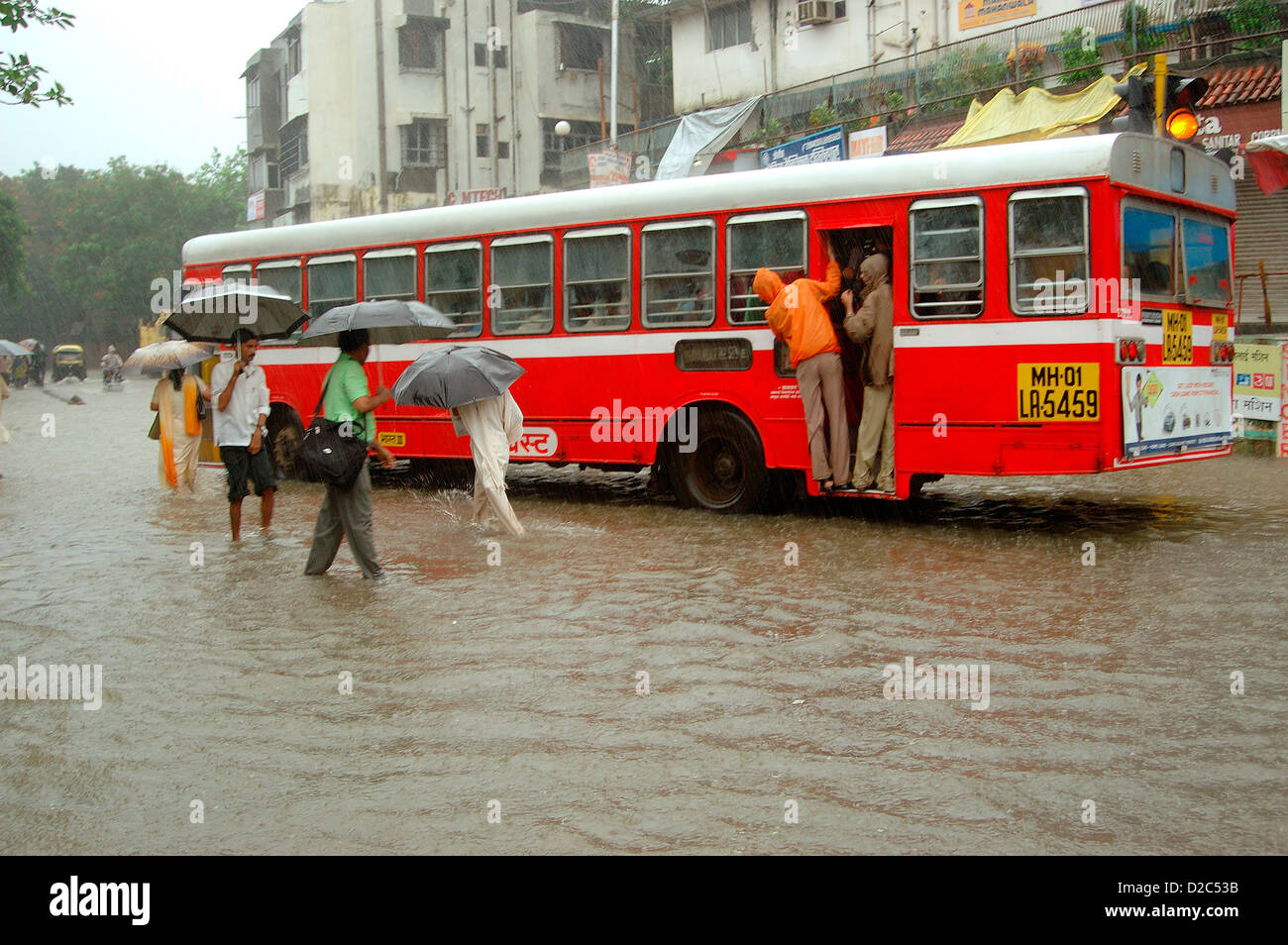 People Boarding Bus In Heavy Rain At Bombay Mumbai, Maharashtra, India ...