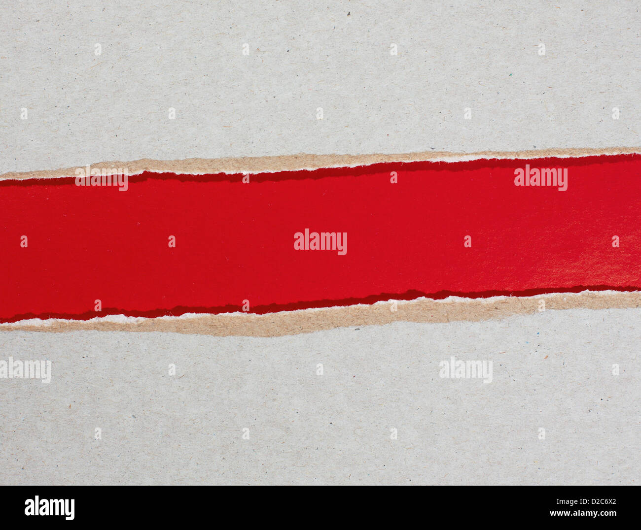 Red Ripped Cardboard torn cardboard over red paper Stock Photo - Alamy