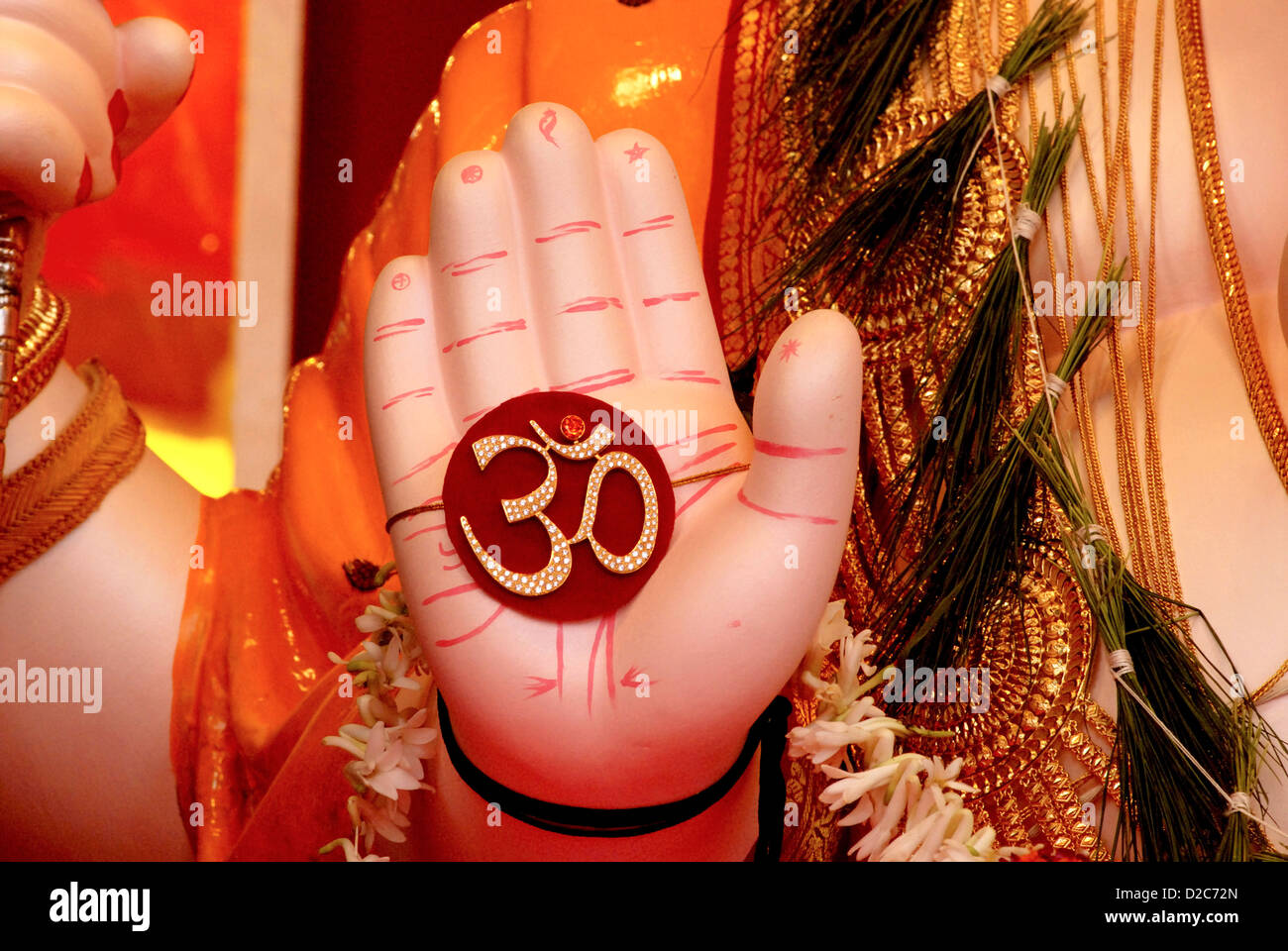 Close-Up Of Palm Of Lord Ganesh Idol With Holy Sign Om, Ganapati Festival At Pune, Maharashtra, India Stock Photo