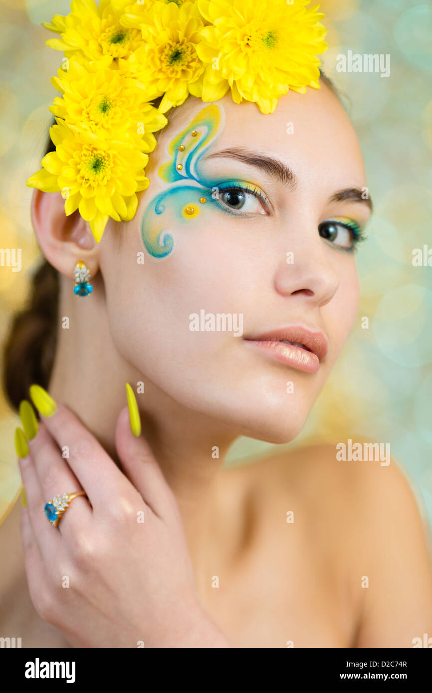 Young girl model with fantasy makeup closeup portrait Stock Photo
