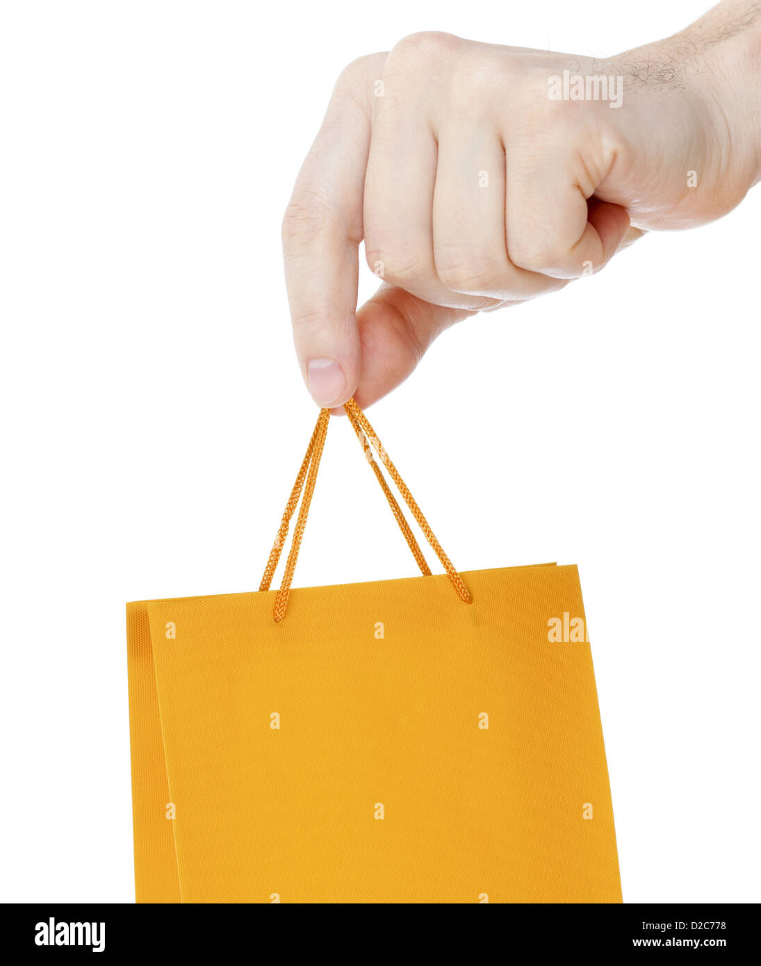 Hand close up with orange shopping bag isolated on white Stock Photo