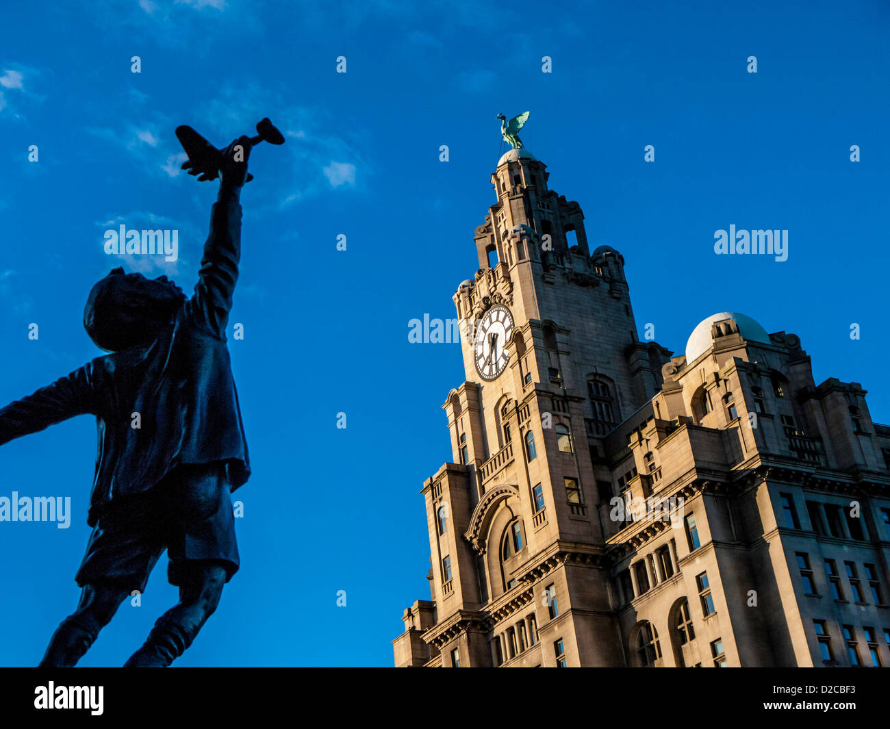 Blitz Memorial and Royal Liver Building, Liverpool, UK from the grounds of Liverpool Parish Church Our Lady and Saint Nicholas Stock Photo