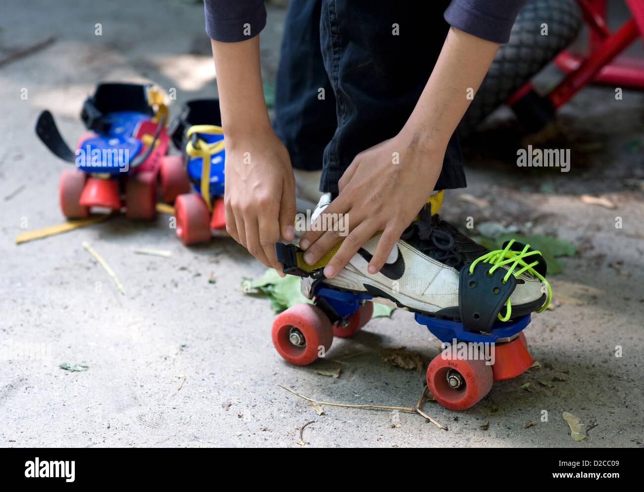 Berlin, Germany, a boy strapped on his skates Stock Photo