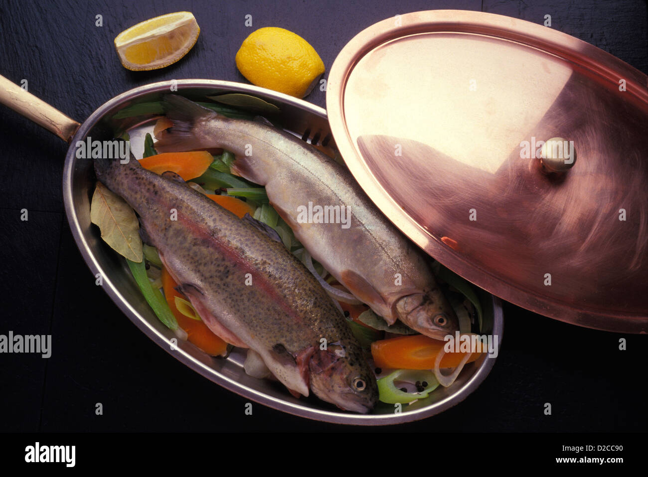 Trout In A Frying Pan With Vegetables Stock Photo Alamy