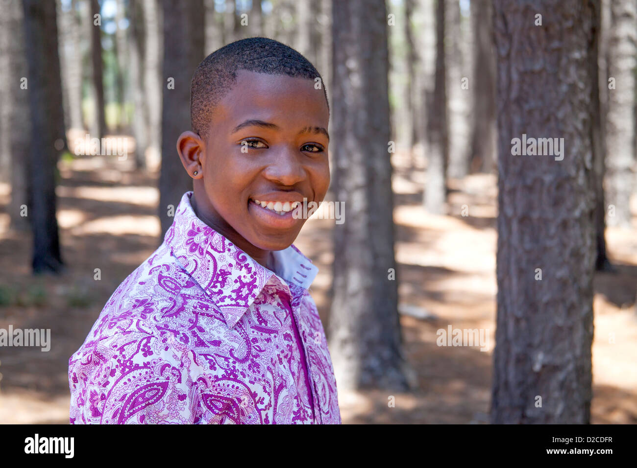 Teenage african boy in nature Stock Photo - Alamy