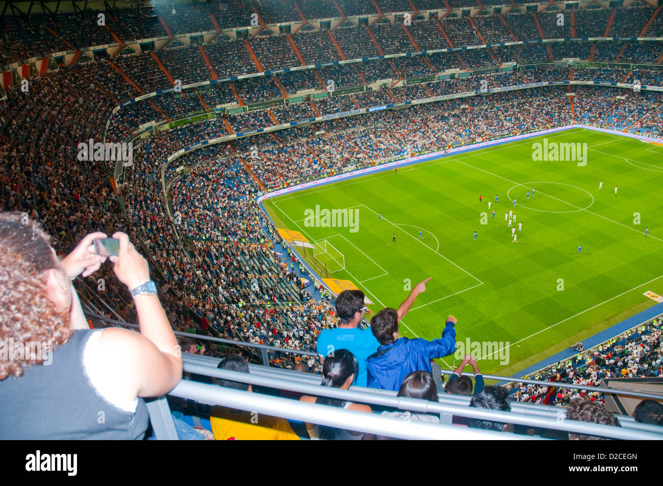 People at Santiago Bernabeu stadium during Real Madrid football match. Madrid, Spain. Stock Photo