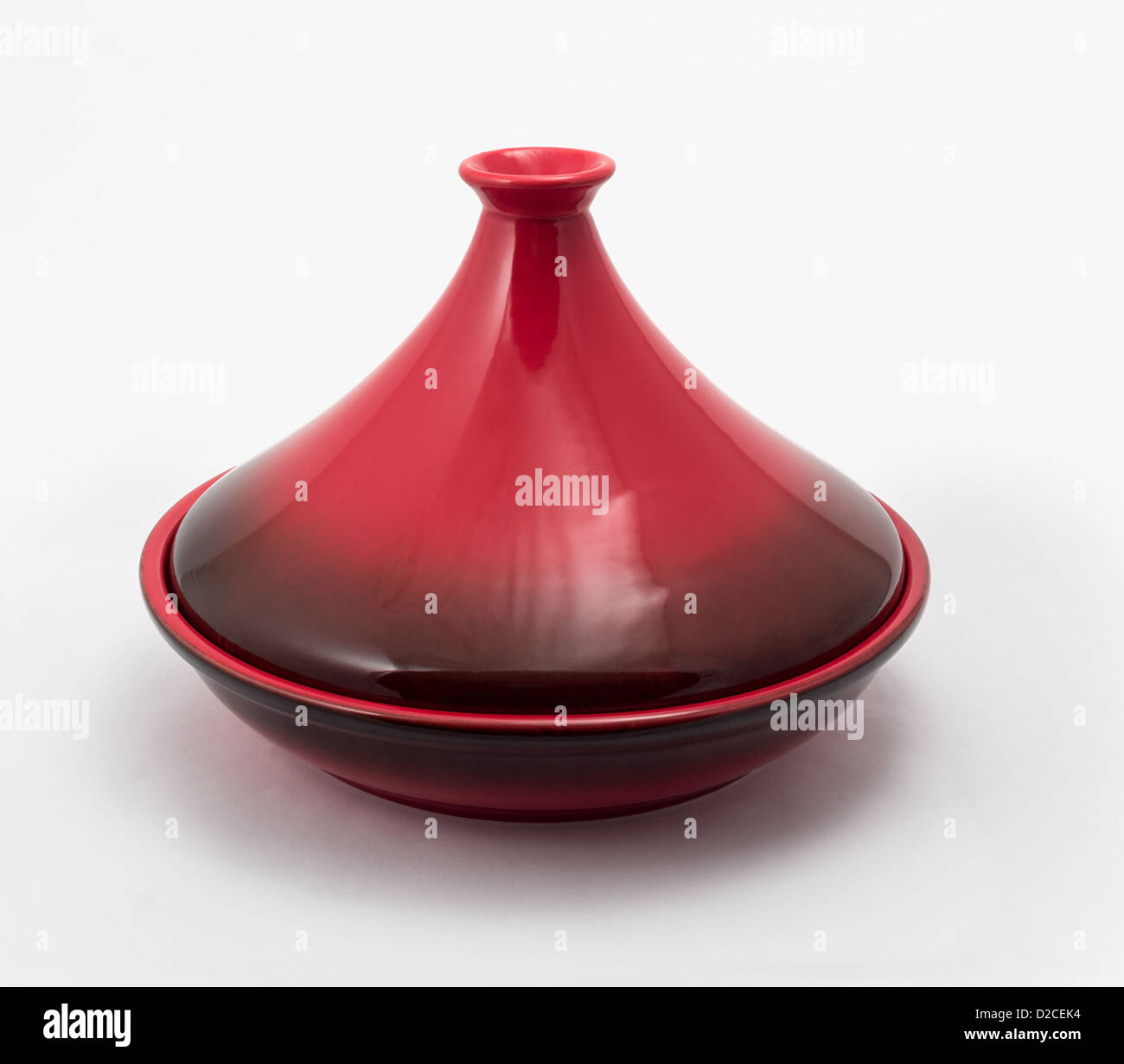 Tagine (Tajine) a type of cookware from Morocco, shown with lid on. Stock Photo