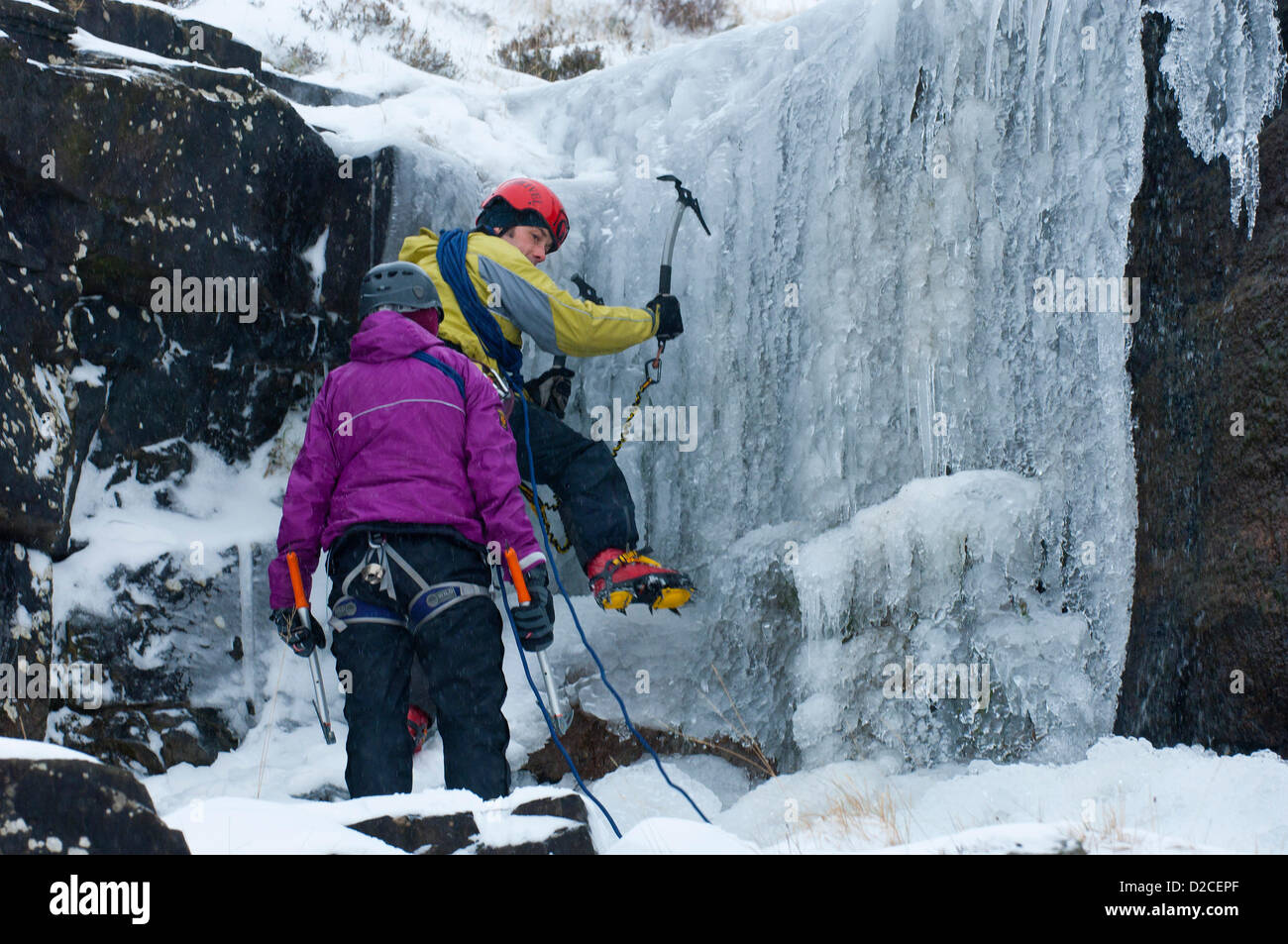 Brecon Beacons, Wales, UK. 20th January, 2013. Acouple of  ice climbers from Brecon, UK.  tackle a cascade near Storey Arms. Photo credit: Graham M. Lawrence/Alamy Live News. Stock Photo