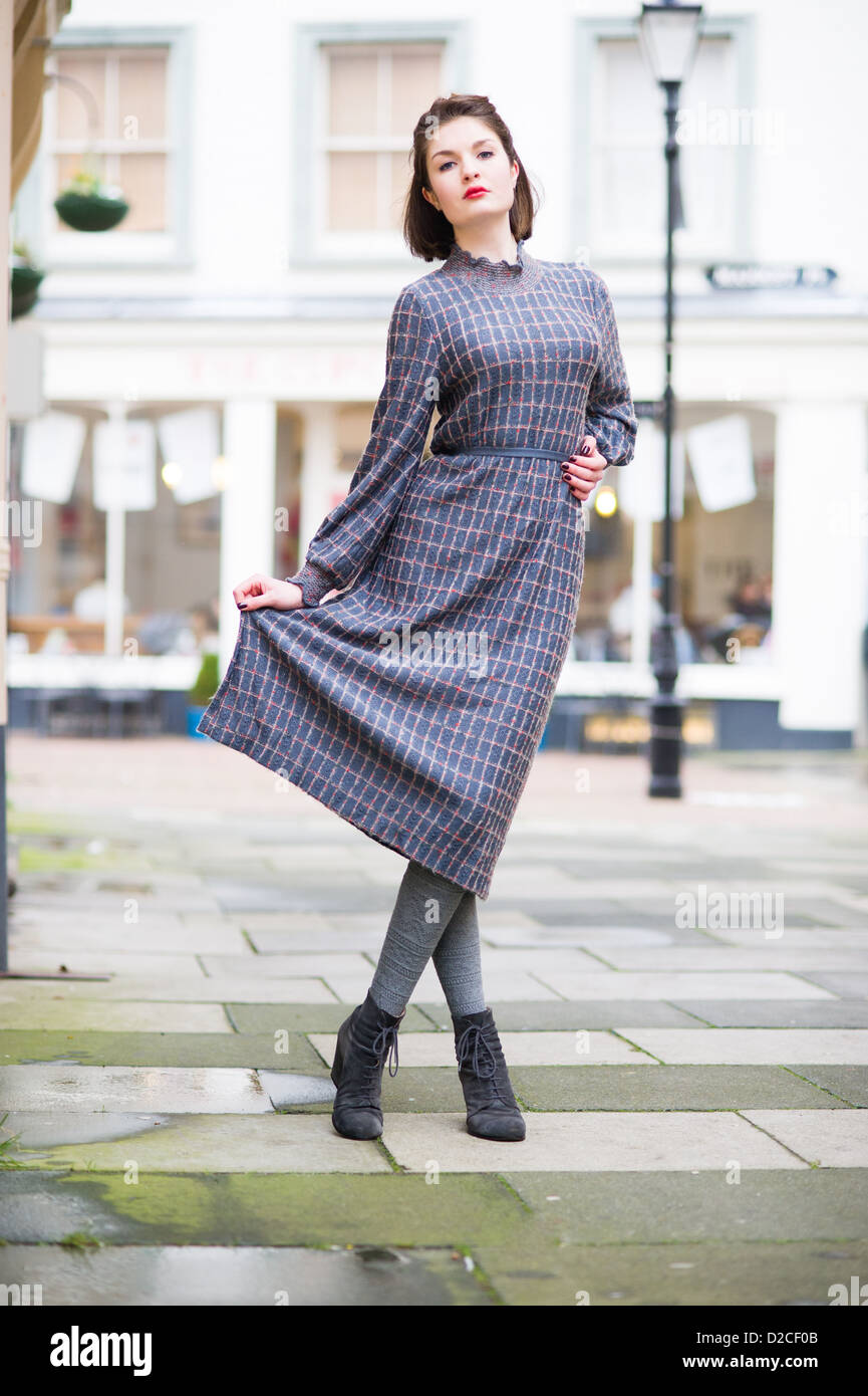 Pretty model wearing vintage 1970's Jumper Dress Stock Photo