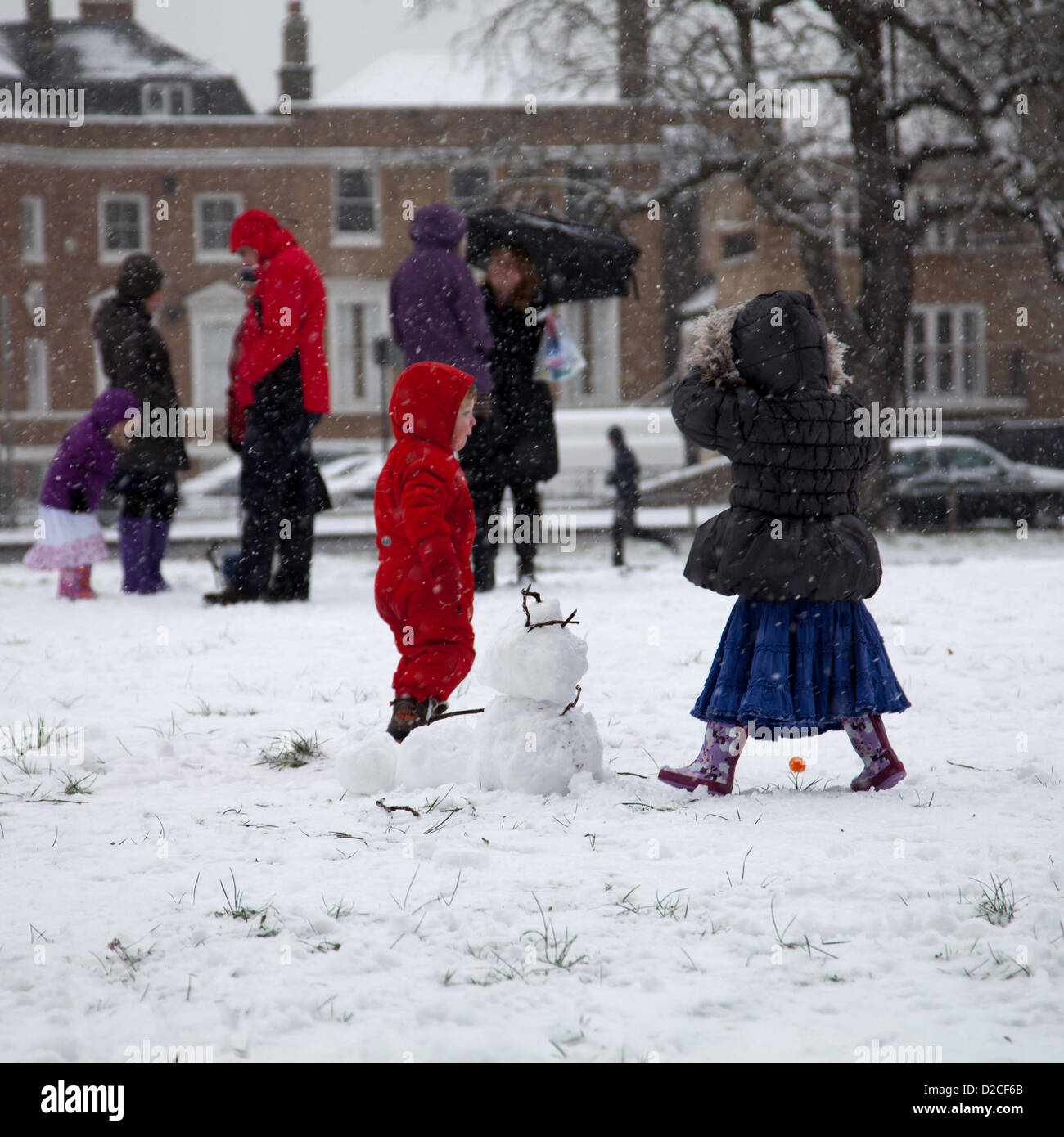 20 January 2013  13.16 PM - Snow falls on Clapham Common in Clapham, London, UK. Children playing in the snow. Stock Photo