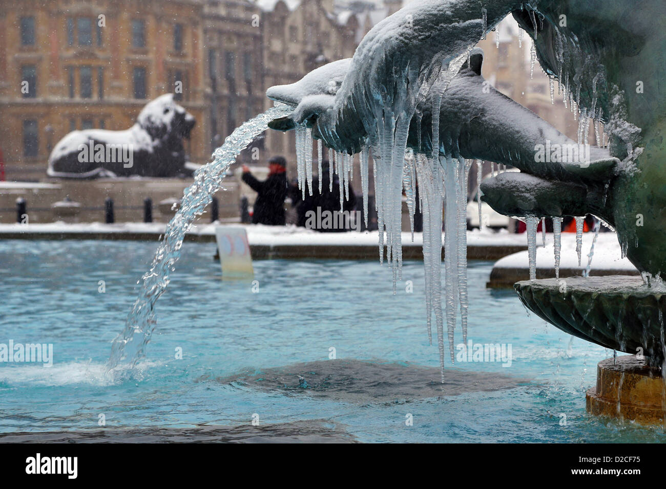London, UK. 20th January 2013. Snow and ice on frozen fountains in Trafalgar Square, London, England. Alamy Live News Stock Photo