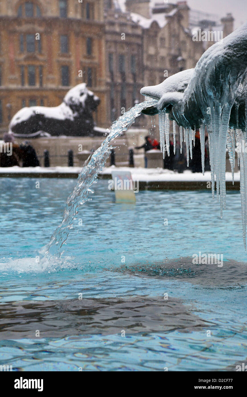 London, UK. 20th January 2013. Snow and ice on frozen fountains in Trafalgar Square, London, England. Alamy Live News Stock Photo