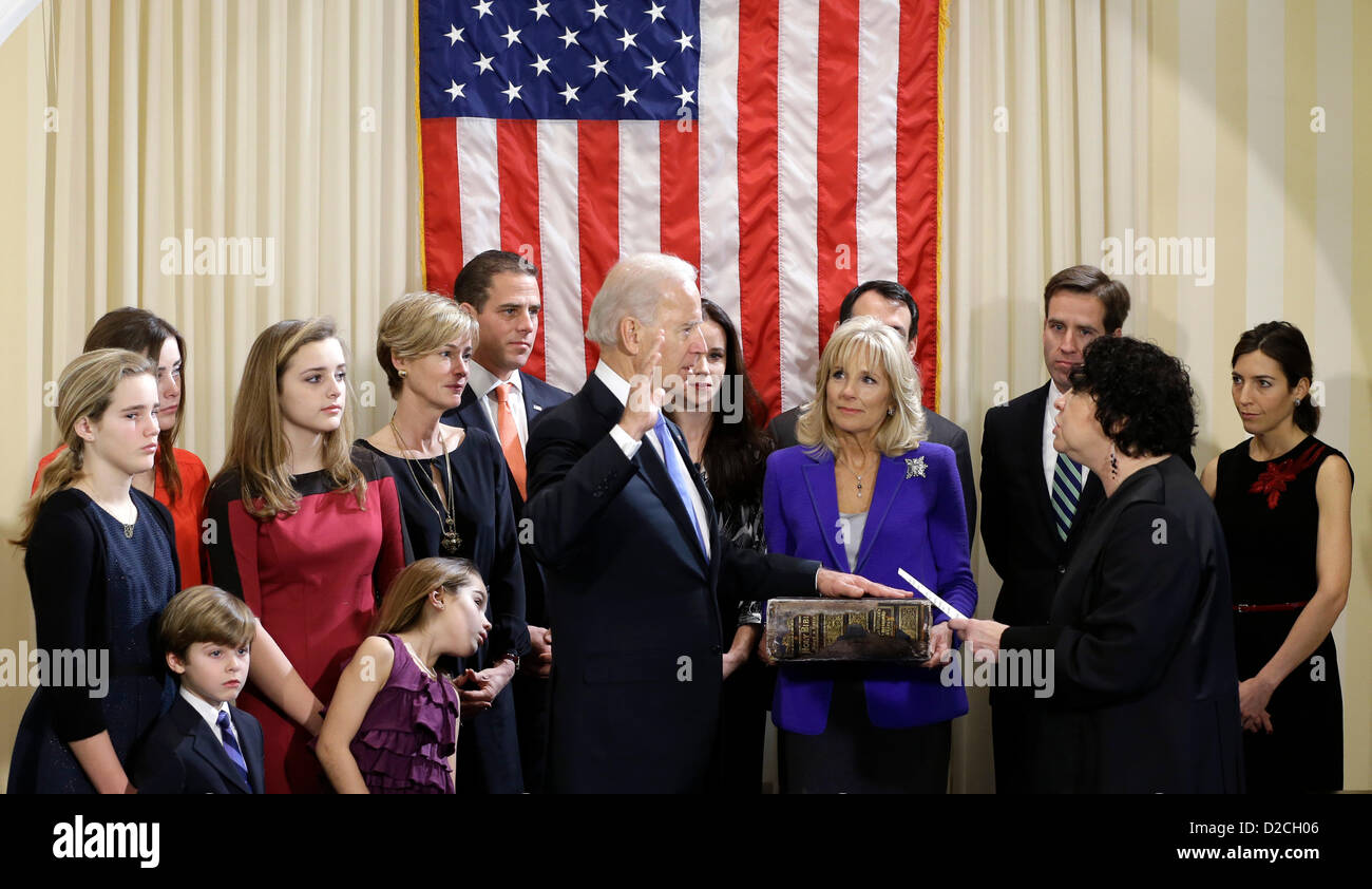 Washington D.C, USA. Sunday 20th January 2013. United States Vice President Joe Biden, with his wife Jill Biden holding the Biden Family Bible, takes the oath of office from Supreme Court Justice Sonia Sotomayor surrounded by family during an official ceremony at the Naval Observatory in Washington.Family members from left: Maisy Biden, R. Hunter Biden, Noami Biden, Finnegan Biden, Natalie Biden, Kathleen Biden, Hunter Biden, Ashley Biden, Howard Krein, Beau Biden, Hallie Biden..Credit: Carolyn Kaster / Pool via CNP/Alamy Live News Stock Photo