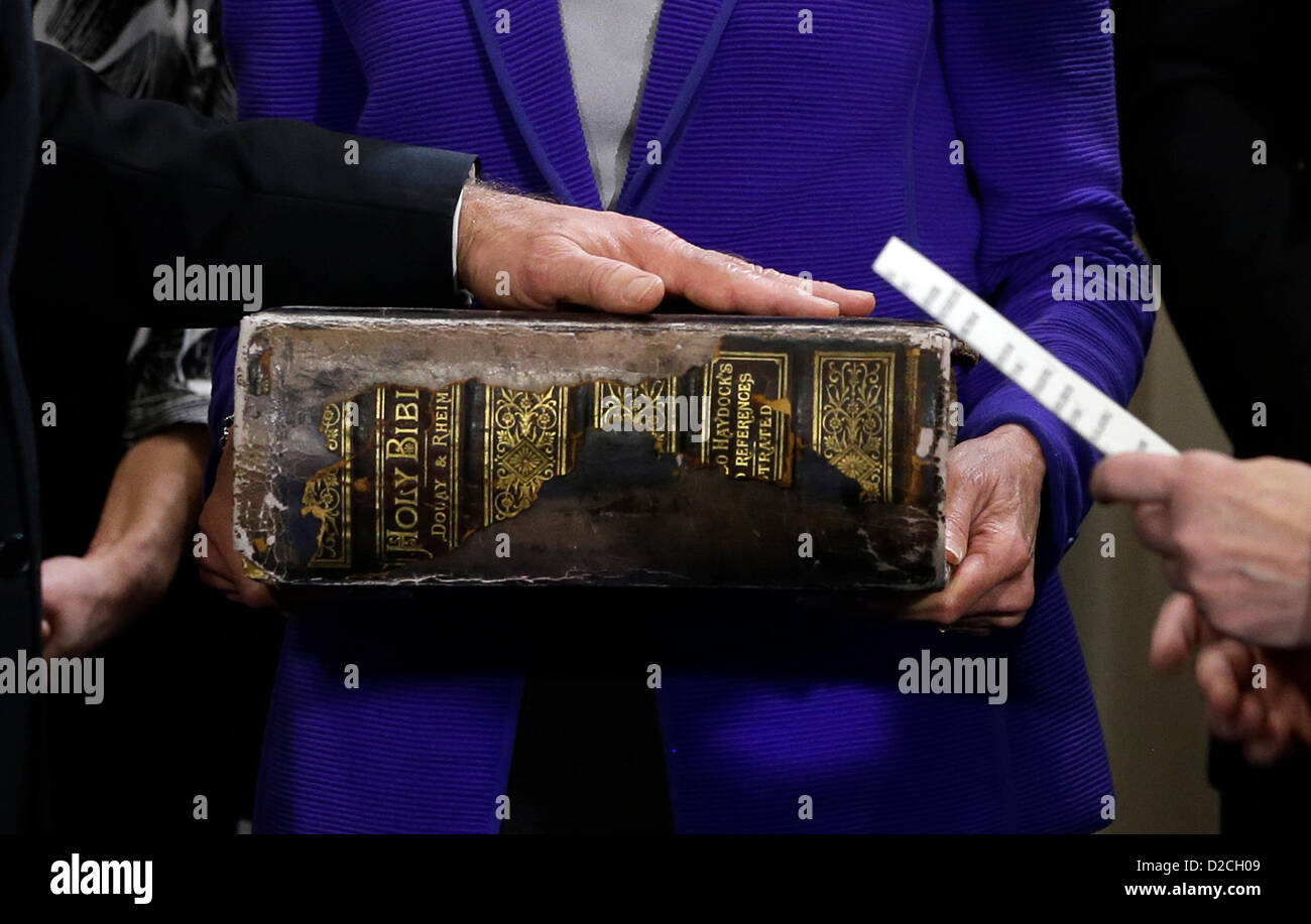 Washington D.C, USA. Sunday 20th January 2013. United States Vice President Joe Biden, left, places his hand on the Biden Family Bible held by his wife Jill Biden, center, as he takes the oath of office from Supreme Court Justice Sonia Sotomayor, right, during and official ceremony at the Naval Observatory in Washington..Credit: Carolyn Kaster / Pool via CNP/Alamy Live News Stock Photo