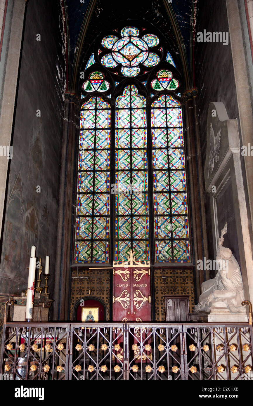 Gothic stained glass window in the Cathedral of Notre Dame de Paris Stock Photo