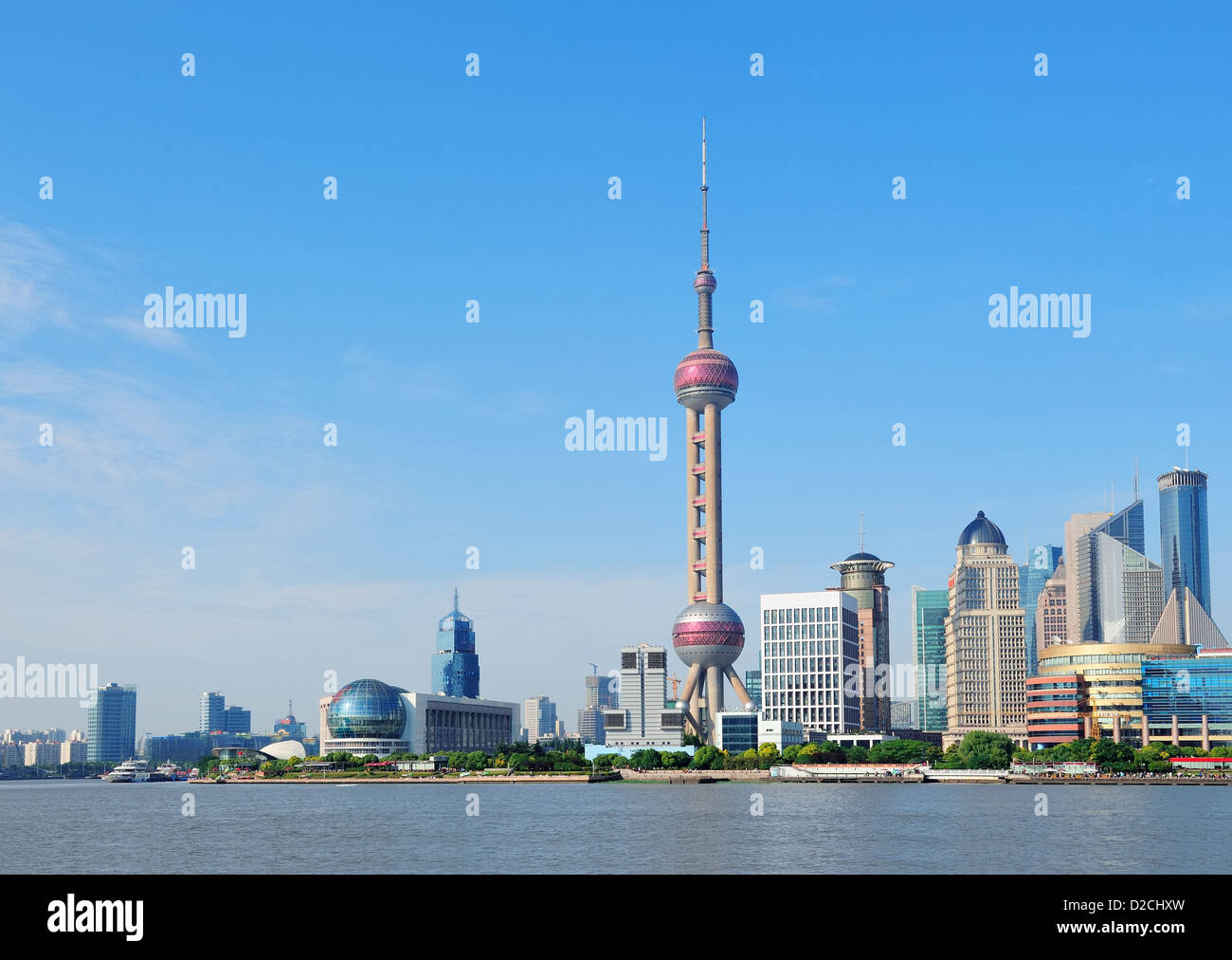 Shanghai skyline with skyscrapers and blue clear sky over Huangpu River. Stock Photo